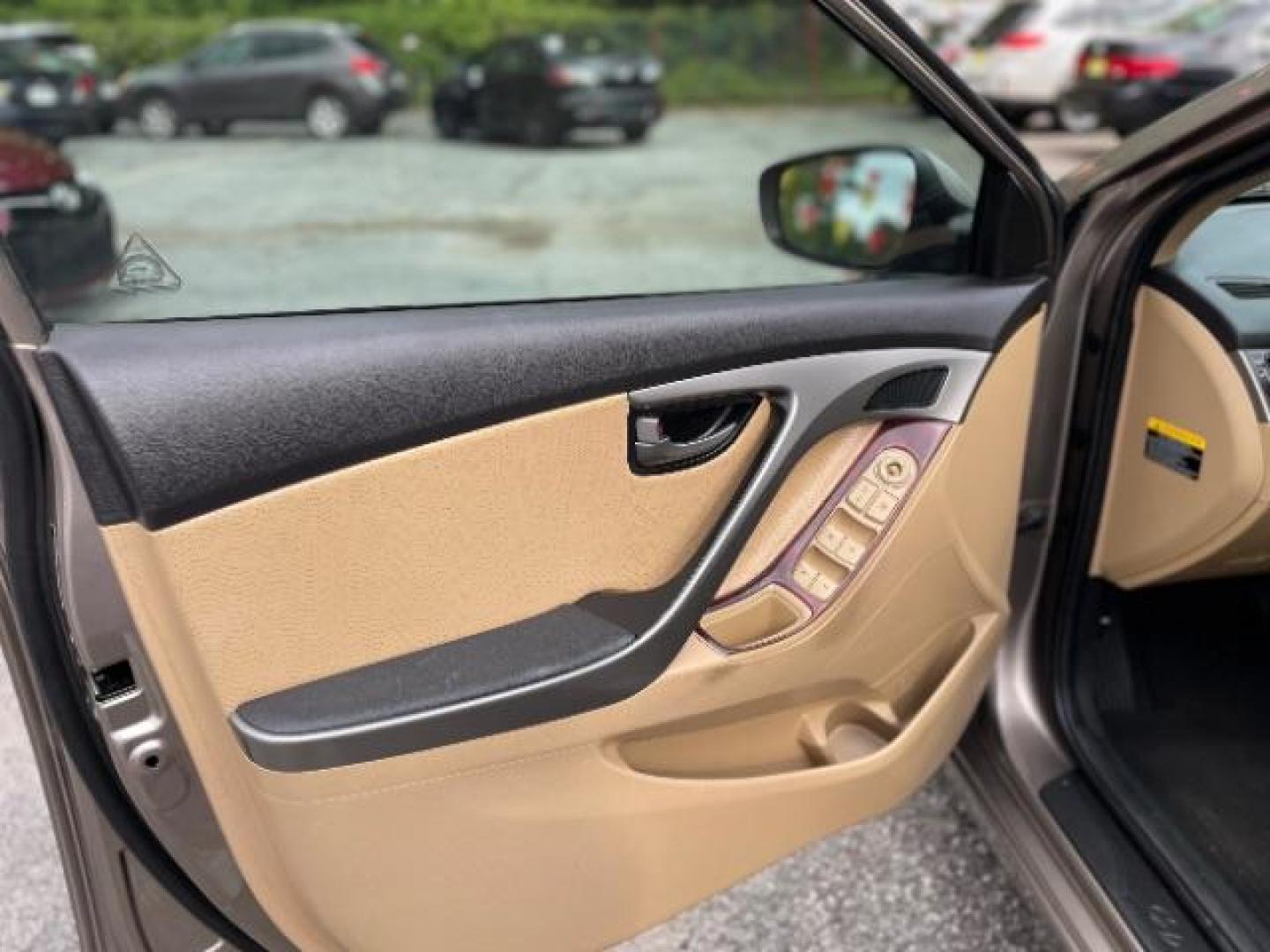 2013 Brown Hyundai Elantra Limited (5NPDH4AE1DH) with an 1.8L L4 DOHC 16V engine, 6-Speed Automatic transmission, located at 1806 Veterans Memorial Hwy SW, Austell, GA, 30168, (770) 944-9558, 33.817959, -84.606987 - Photo#13