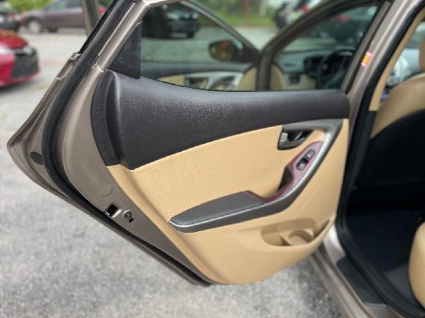 2013 Brown Hyundai Elantra Limited (5NPDH4AE1DH) with an 1.8L L4 DOHC 16V engine, 6-Speed Automatic transmission, located at 1806 Veterans Memorial Hwy SW, Austell, GA, 30168, (770) 944-9558, 33.817959, -84.606987 - Photo#14