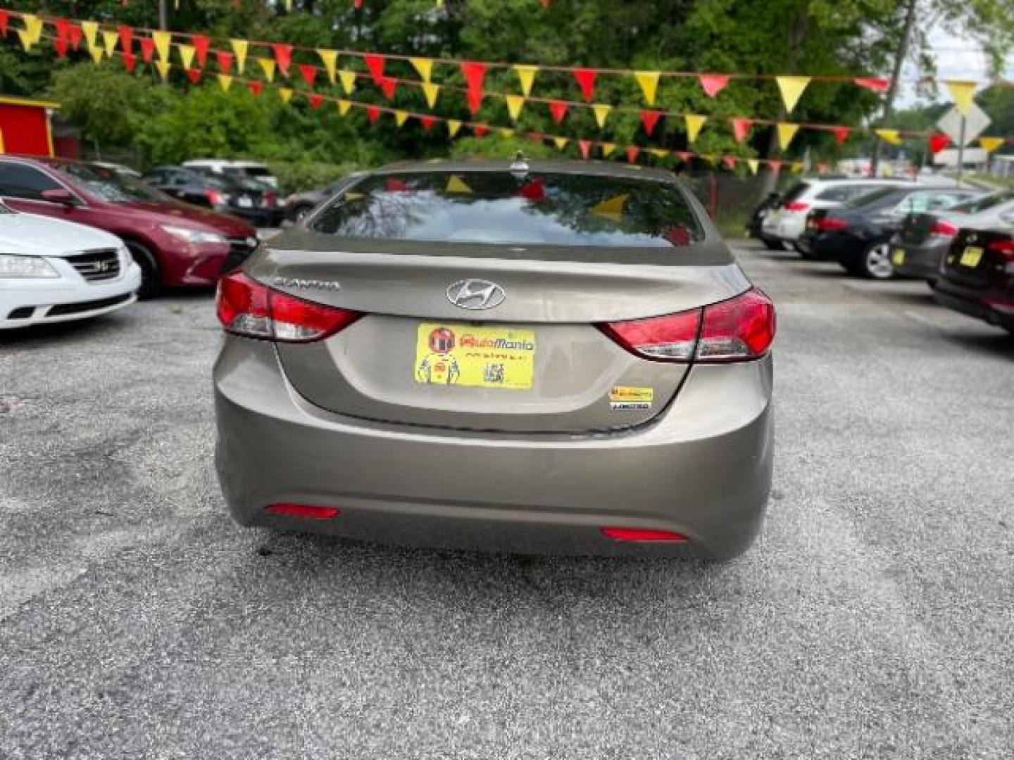 2013 Brown Hyundai Elantra Limited (5NPDH4AE1DH) with an 1.8L L4 DOHC 16V engine, 6-Speed Automatic transmission, located at 1806 Veterans Memorial Hwy SW, Austell, GA, 30168, (770) 944-9558, 33.817959, -84.606987 - Photo#4