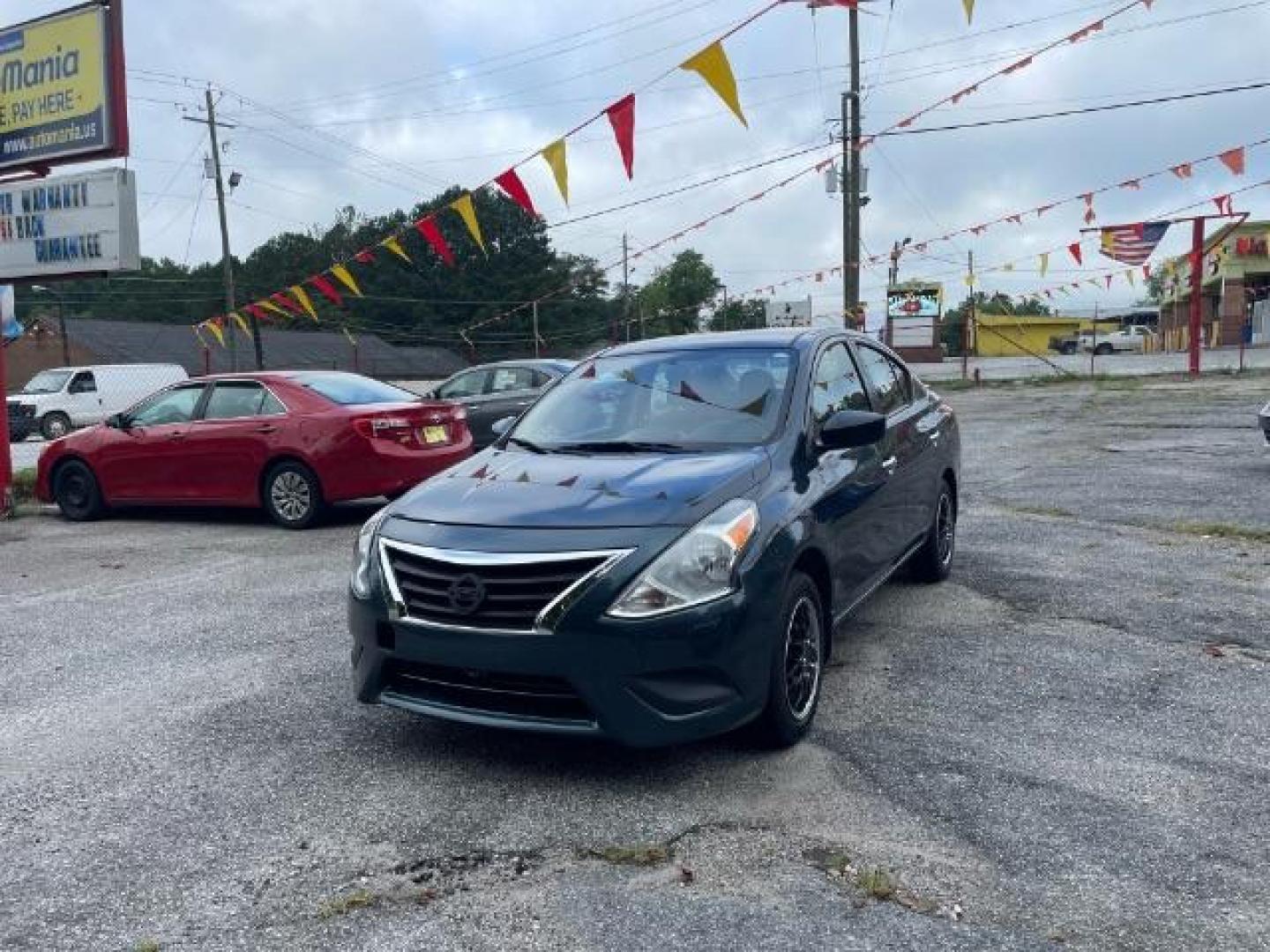 2017 Blue Nissan Versa 1.6 SV Sedan (3N1CN7AP4HL) with an 1.6L L4 DOHC 16V engine, Continuously Variable Transmission transmission, located at 1806 Veterans Memorial Hwy SW, Austell, GA, 30168, (770) 944-9558, 33.817959, -84.606987 - Photo#0