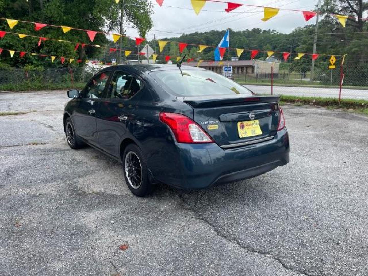 2017 Blue Nissan Versa 1.6 SV Sedan (3N1CN7AP4HL) with an 1.6L L4 DOHC 16V engine, Continuously Variable Transmission transmission, located at 1806 Veterans Memorial Hwy SW, Austell, GA, 30168, (770) 944-9558, 33.817959, -84.606987 - Photo#6