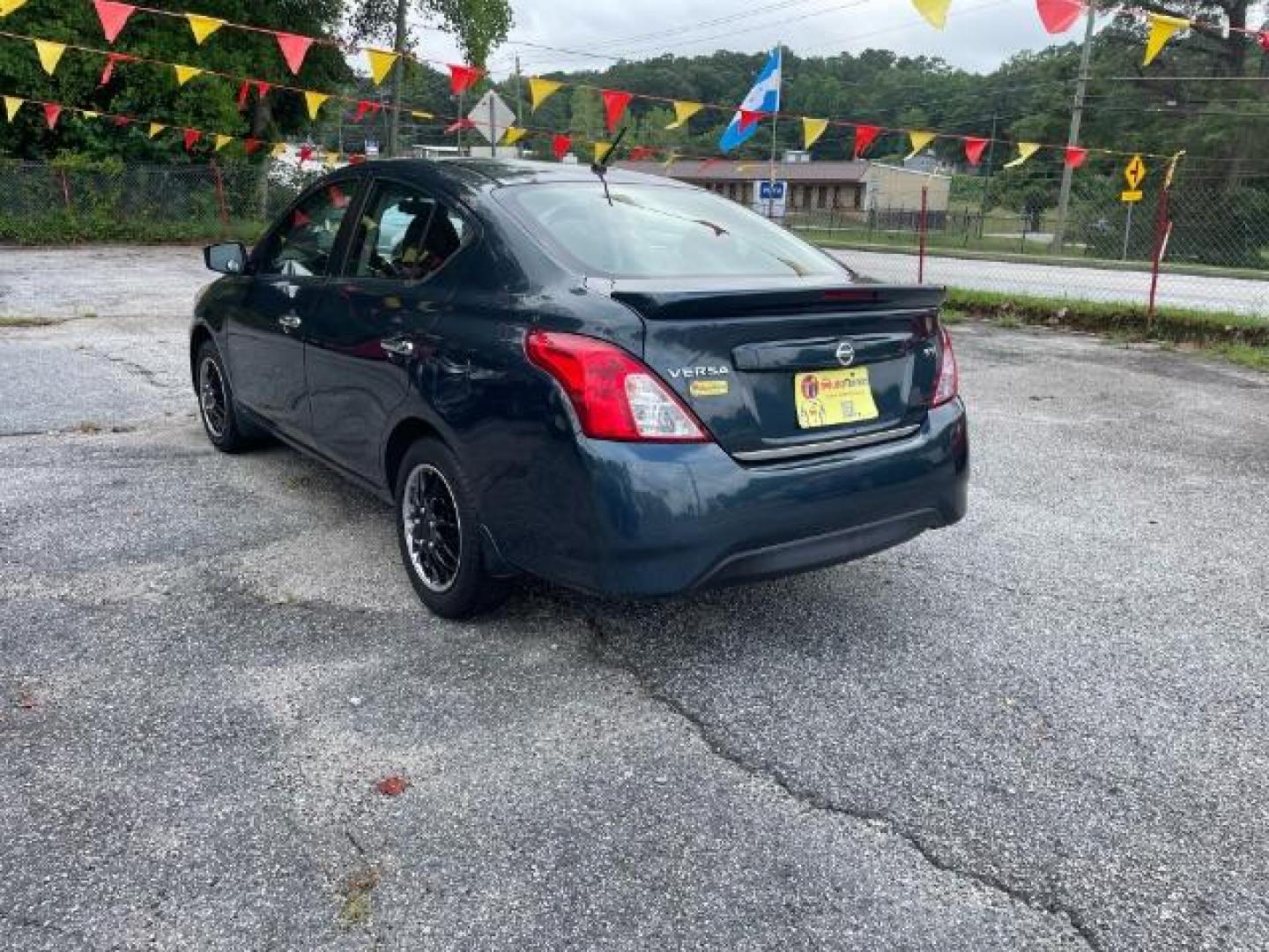 2017 Blue Nissan Versa 1.6 SV Sedan (3N1CN7AP4HL) with an 1.6L L4 DOHC 16V engine, Continuously Variable Transmission transmission, located at 1806 Veterans Memorial Hwy SW, Austell, GA, 30168, (770) 944-9558, 33.817959, -84.606987 - Photo#7