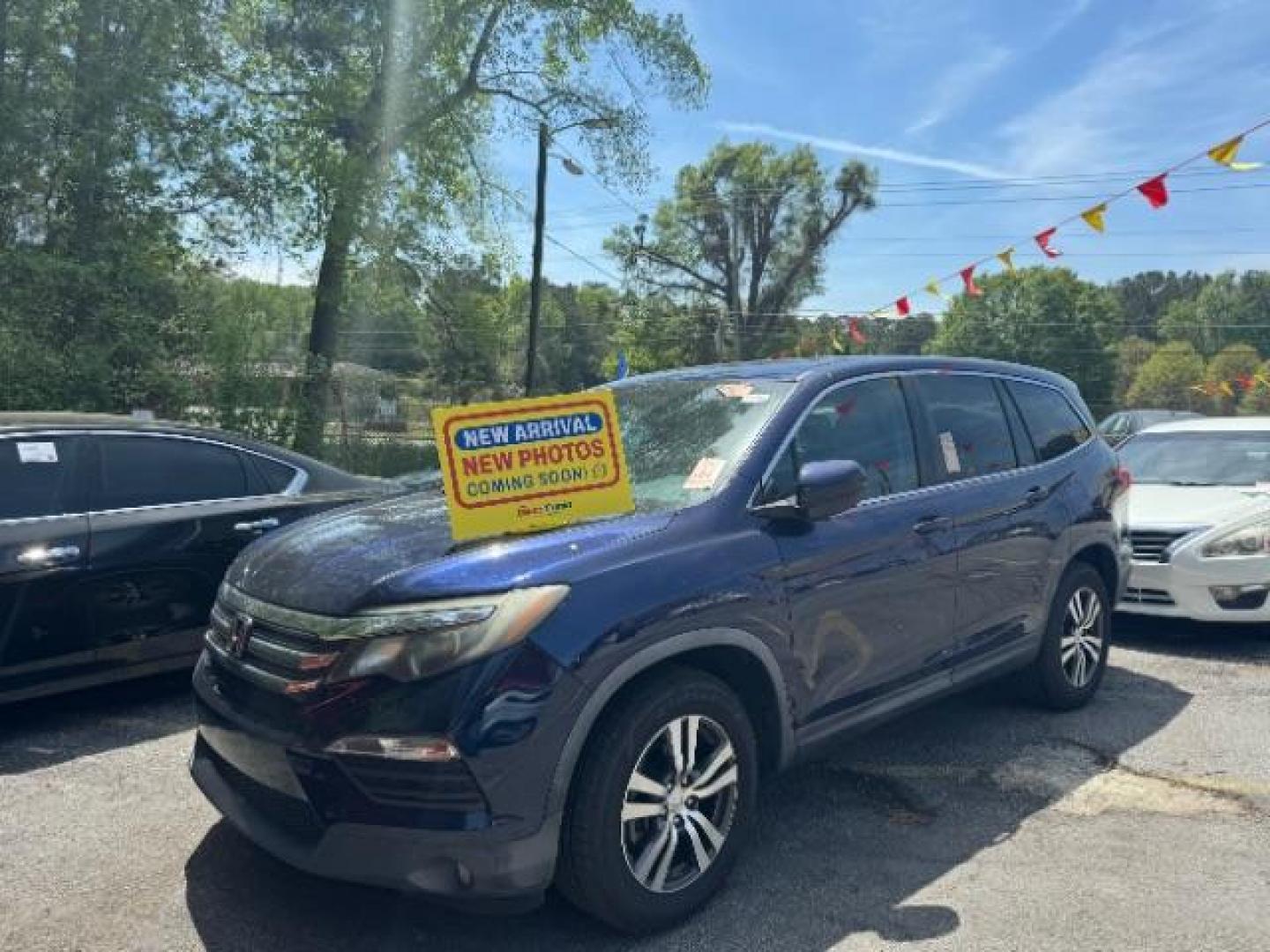 2016 Blue Honda Pilot EX 2WD (5FNYF5H35GB) with an 3.5L V6 SOHC 24V engine, 6-Speed Automatic transmission, located at 1806 Veterans Memorial Hwy SW, Austell, GA, 30168, (770) 944-9558, 33.817959, -84.606987 - Photo#0