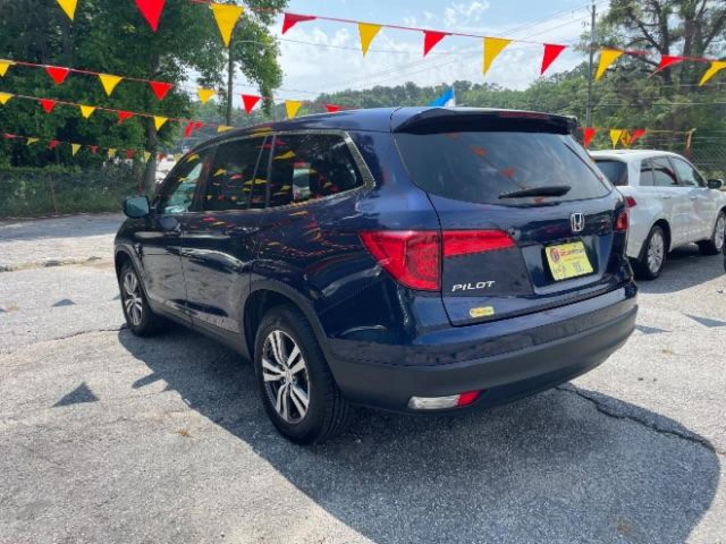 2016 Blue Honda Pilot EX 2WD (5FNYF5H35GB) with an 3.5L V6 SOHC 24V engine, 6-Speed Automatic transmission, located at 1806 Veterans Memorial Hwy SW, Austell, GA, 30168, (770) 944-9558, 33.817959, -84.606987 - Photo#11