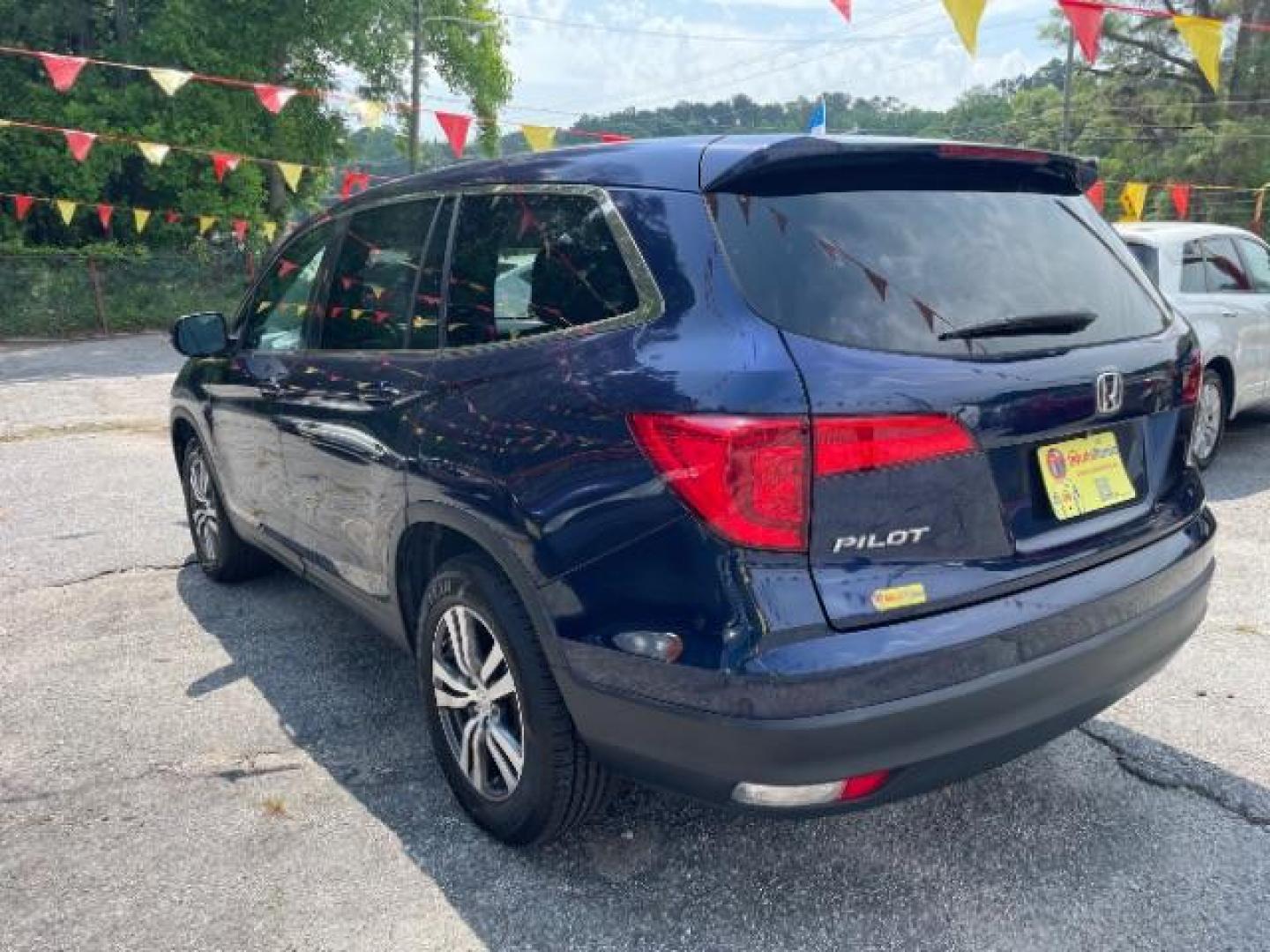 2016 Blue Honda Pilot EX 2WD (5FNYF5H35GB) with an 3.5L V6 SOHC 24V engine, 6-Speed Automatic transmission, located at 1806 Veterans Memorial Hwy SW, Austell, GA, 30168, (770) 944-9558, 33.817959, -84.606987 - Photo#4