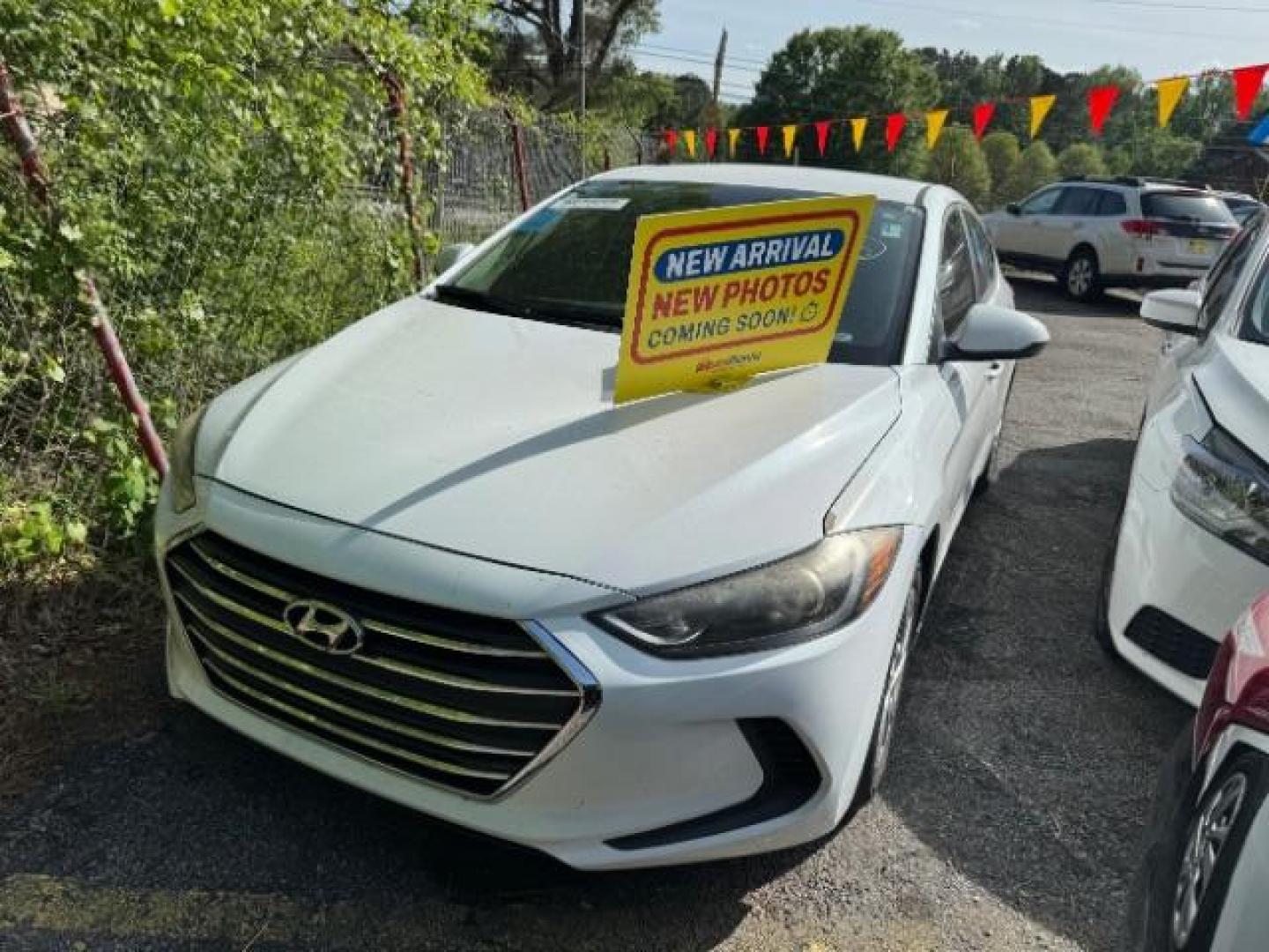 2017 White Hyundai Elantra SE 6AT (5NPD74LF0HH) with an 1.8L L4 DOHC 16V engine, 6-Speed Automatic transmission, located at 1806 Veterans Memorial Hwy SW, Austell, GA, 30168, (770) 944-9558, 33.817959, -84.606987 - Photo#0