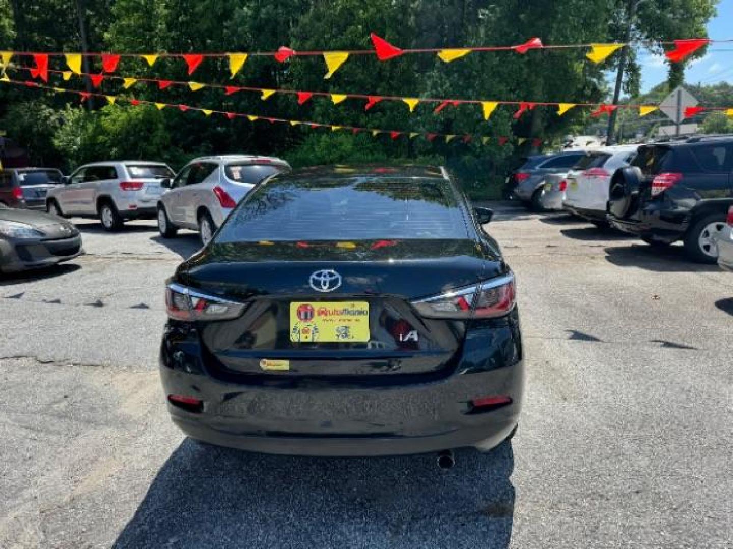 2018 Black Toyota Yaris iA 6A (3MYDLBYVXJY) with an 1.5L L4 DOHC 16V engine, 6-Speed Automatic transmission, located at 1806 Veterans Memorial Hwy SW, Austell, GA, 30168, (770) 944-9558, 33.817959, -84.606987 - Photo#4