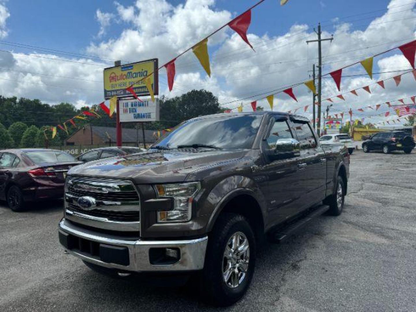 2016 Brown Ford F-150 Lariat SuperCrew 6.5-ft. Bed 4WD (1FTFW1EG9GF) with an 3.5 V6 engine, 6-Speed Automatic transmission, located at 1806 Veterans Memorial Hwy SW, Austell, GA, 30168, (770) 944-9558, 33.817959, -84.606987 - Photo#0