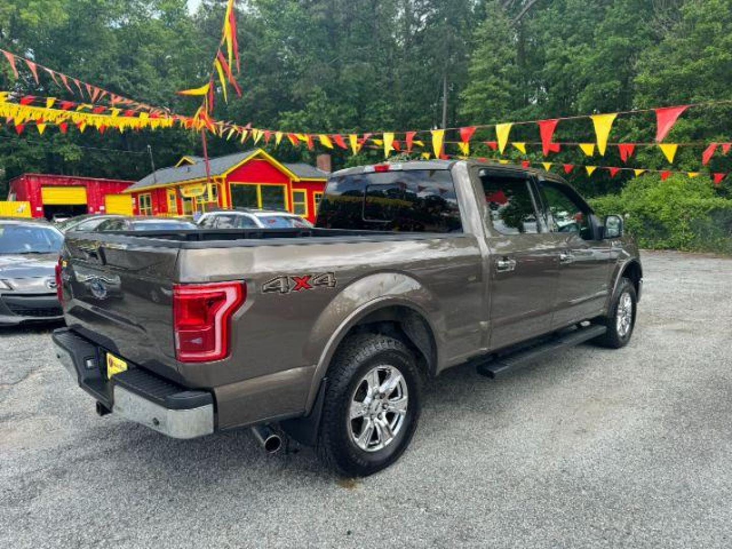 2016 Brown Ford F-150 Lariat SuperCrew 6.5-ft. Bed 4WD (1FTFW1EG9GF) with an 3.5 V6 engine, 6-Speed Automatic transmission, located at 1806 Veterans Memorial Hwy SW, Austell, GA, 30168, (770) 944-9558, 33.817959, -84.606987 - Photo#2