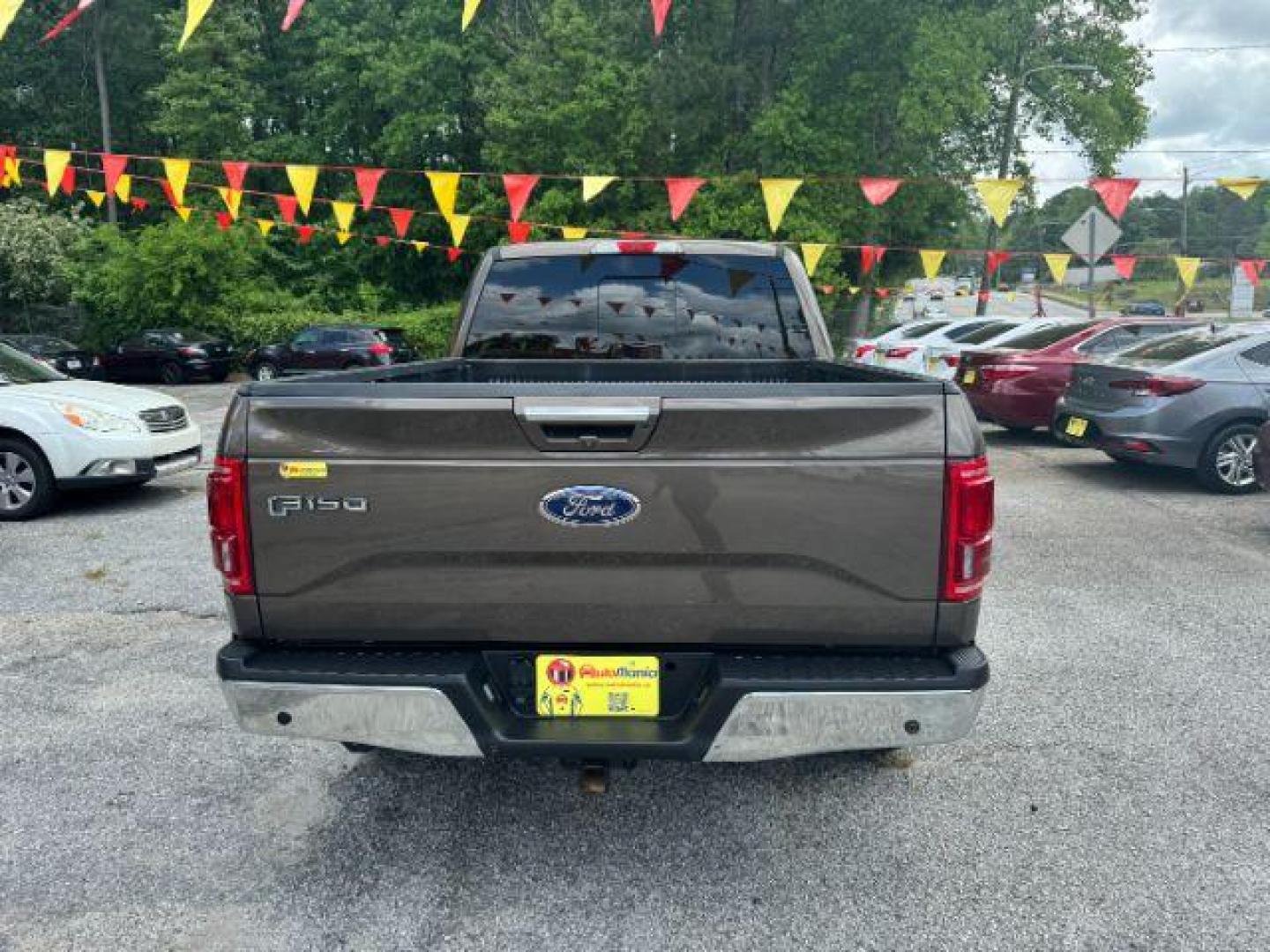 2016 Brown Ford F-150 Lariat SuperCrew 6.5-ft. Bed 4WD (1FTFW1EG9GF) with an 3.5 V6 engine, 6-Speed Automatic transmission, located at 1806 Veterans Memorial Hwy SW, Austell, GA, 30168, (770) 944-9558, 33.817959, -84.606987 - Photo#4