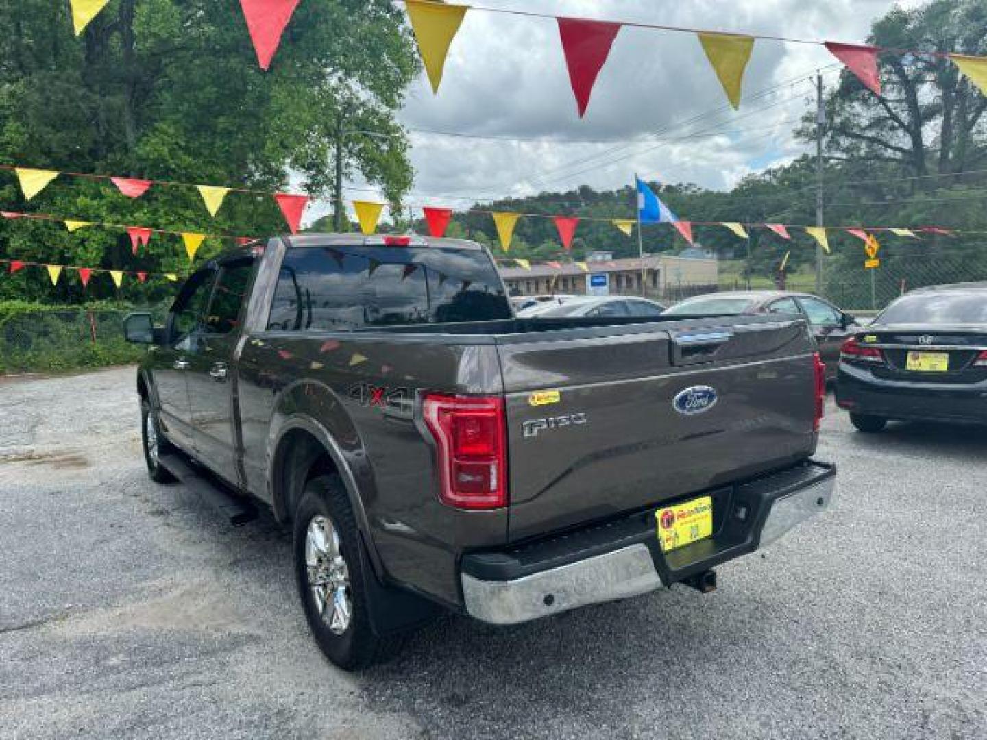 2016 Brown Ford F-150 Lariat SuperCrew 6.5-ft. Bed 4WD (1FTFW1EG9GF) with an 3.5 V6 engine, 6-Speed Automatic transmission, located at 1806 Veterans Memorial Hwy SW, Austell, GA, 30168, (770) 944-9558, 33.817959, -84.606987 - Photo#5