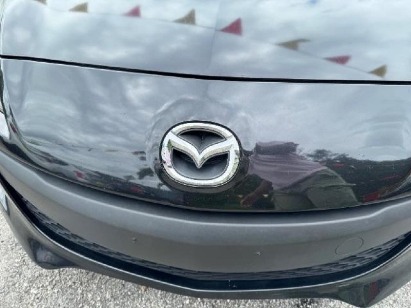 2013 Black Mazda MAZDA3 i SV AT 4-Door (JM1BL1TF0D1) with an 2.0L L4 DOHC 16V engine, 5-Speed Automatic transmission, located at 1806 Veterans Memorial Hwy SW, Austell, GA, 30168, (770) 944-9558, 33.817959, -84.606987 - Photo#17