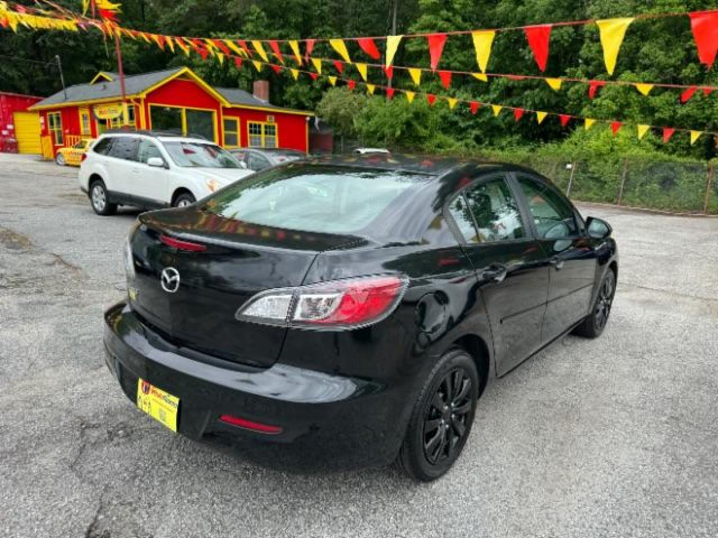 2013 Black Mazda MAZDA3 i SV AT 4-Door (JM1BL1TF0D1) with an 2.0L L4 DOHC 16V engine, 5-Speed Automatic transmission, located at 1806 Veterans Memorial Hwy SW, Austell, GA, 30168, (770) 944-9558, 33.817959, -84.606987 - Photo#3