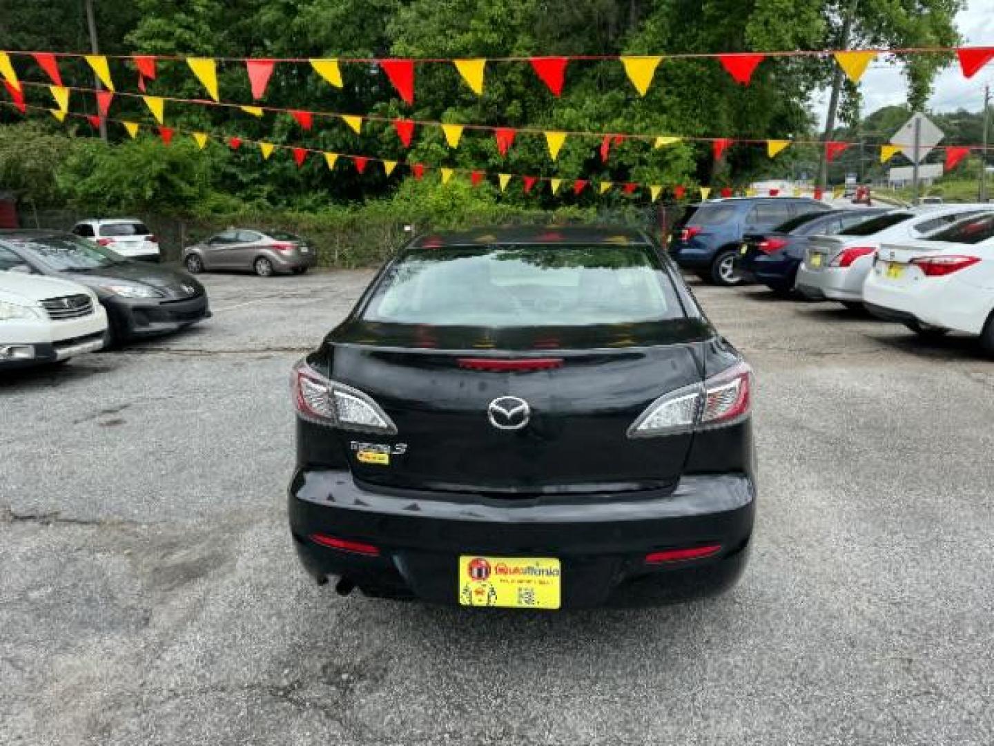 2013 Black Mazda MAZDA3 i SV AT 4-Door (JM1BL1TF0D1) with an 2.0L L4 DOHC 16V engine, 5-Speed Automatic transmission, located at 1806 Veterans Memorial Hwy SW, Austell, GA, 30168, (770) 944-9558, 33.817959, -84.606987 - Photo#5