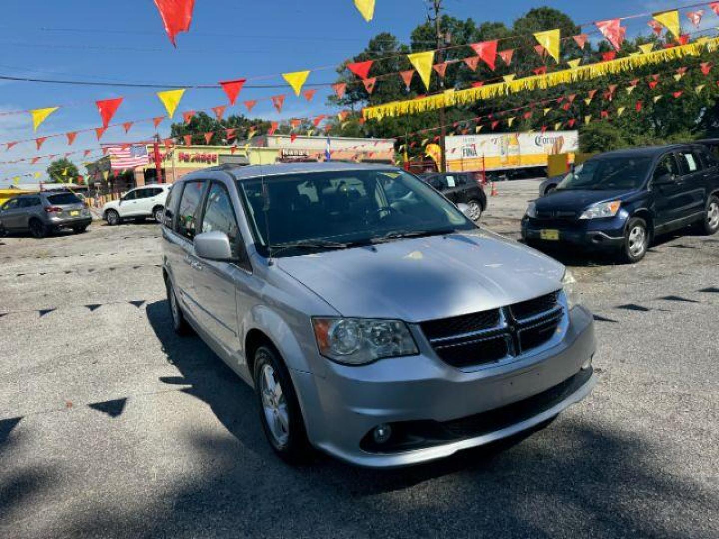 2011 Silver Dodge Grand Caravan Crew (2D4RN5DG3BR) with an 3.6L V6 DOHC 24V engine, 6-Speed Automatic transmission, located at 1806 Veterans Memorial Hwy SW, Austell, GA, 30168, (770) 944-9558, 33.817959, -84.606987 - Photo#0