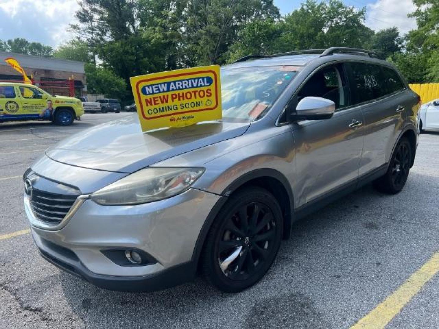 2015 Silver Mazda CX-9 Grand Touring (JM3TB2DAXF0) with an 3.7L V6 DOHC 24V engine, 6-Speed Automatic transmission, located at 1806 Veterans Memorial Hwy SW, Austell, GA, 30168, (770) 944-9558, 33.817959, -84.606987 - Photo#0