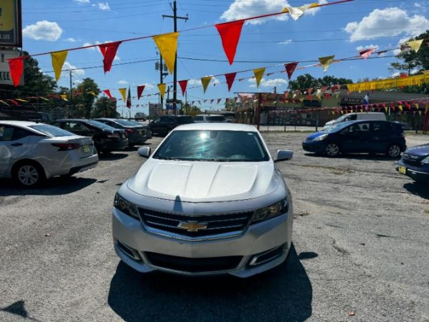 2014 Silver Chevrolet Impala 1LT (2G1115SL5E9) with an 2.5L L4 DOHC 16V engine, 6-Speed Automatic transmission, located at 1806 Veterans Memorial Hwy SW, Austell, GA, 30168, (770) 944-9558, 33.817959, -84.606987 - Photo#1