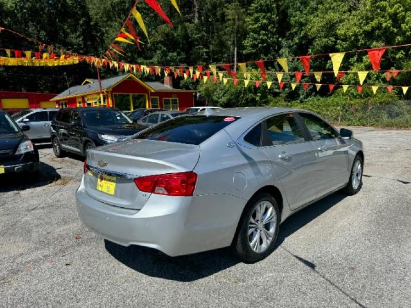 2014 Silver Chevrolet Impala 1LT (2G1115SL5E9) with an 2.5L L4 DOHC 16V engine, 6-Speed Automatic transmission, located at 1806 Veterans Memorial Hwy SW, Austell, GA, 30168, (770) 944-9558, 33.817959, -84.606987 - Photo#3