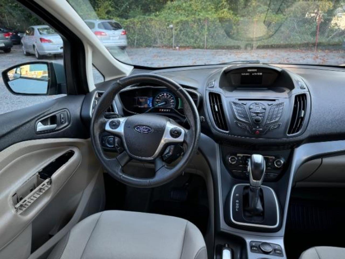 2013 Blue Ford C-Max Hybrid SE (1FADP5AU2DL) with an 2.0L L4 DOHC 16V HYBRID engine, Continuously Variable Transmission transmission, located at 1806 Veterans Memorial Hwy SW, Austell, GA, 30168, (770) 944-9558, 33.817959, -84.606987 - Photo#11