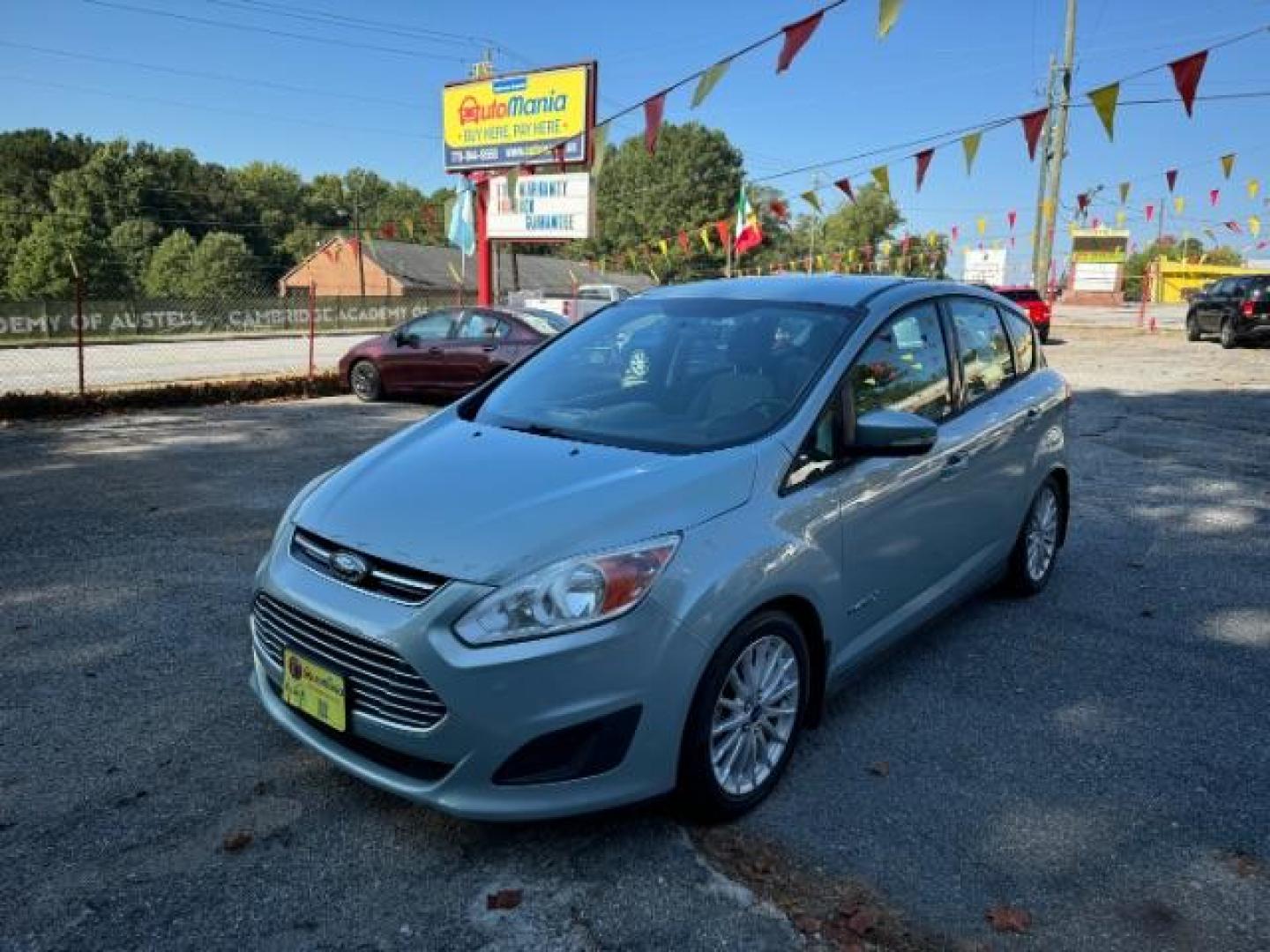 2013 Blue Ford C-Max Hybrid SE (1FADP5AU2DL) with an 2.0L L4 DOHC 16V HYBRID engine, Continuously Variable Transmission transmission, located at 1806 Veterans Memorial Hwy SW, Austell, GA, 30168, (770) 944-9558, 33.817959, -84.606987 - Photo#0