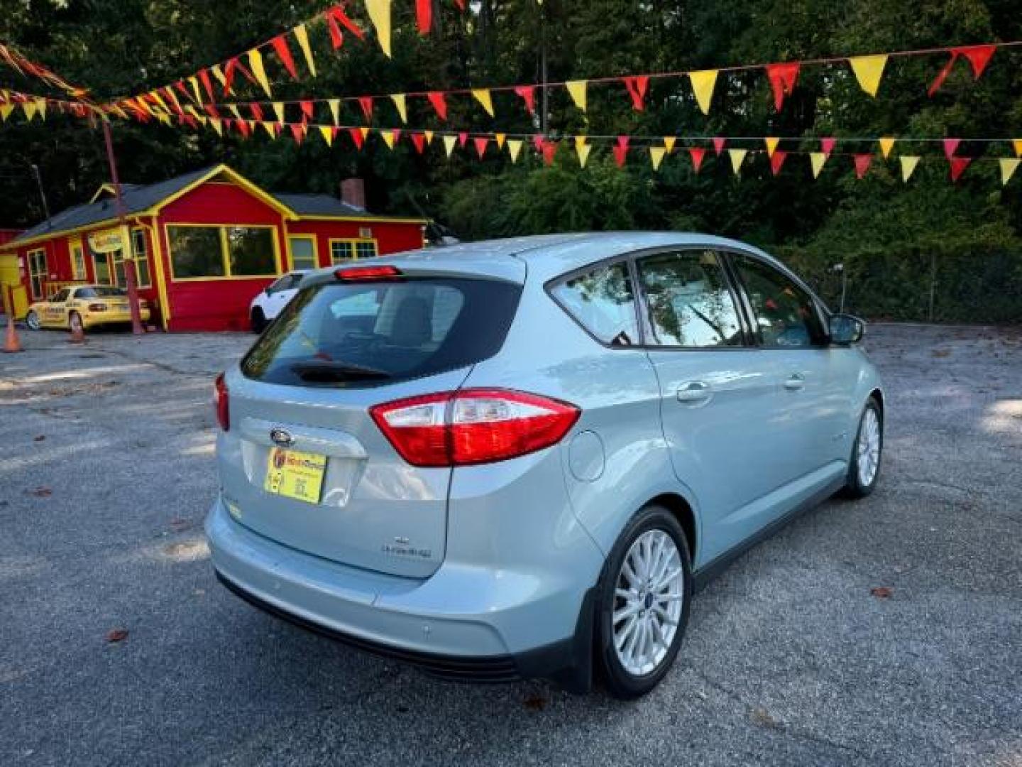 2013 Blue Ford C-Max Hybrid SE (1FADP5AU2DL) with an 2.0L L4 DOHC 16V HYBRID engine, Continuously Variable Transmission transmission, located at 1806 Veterans Memorial Hwy SW, Austell, GA, 30168, (770) 944-9558, 33.817959, -84.606987 - Photo#3