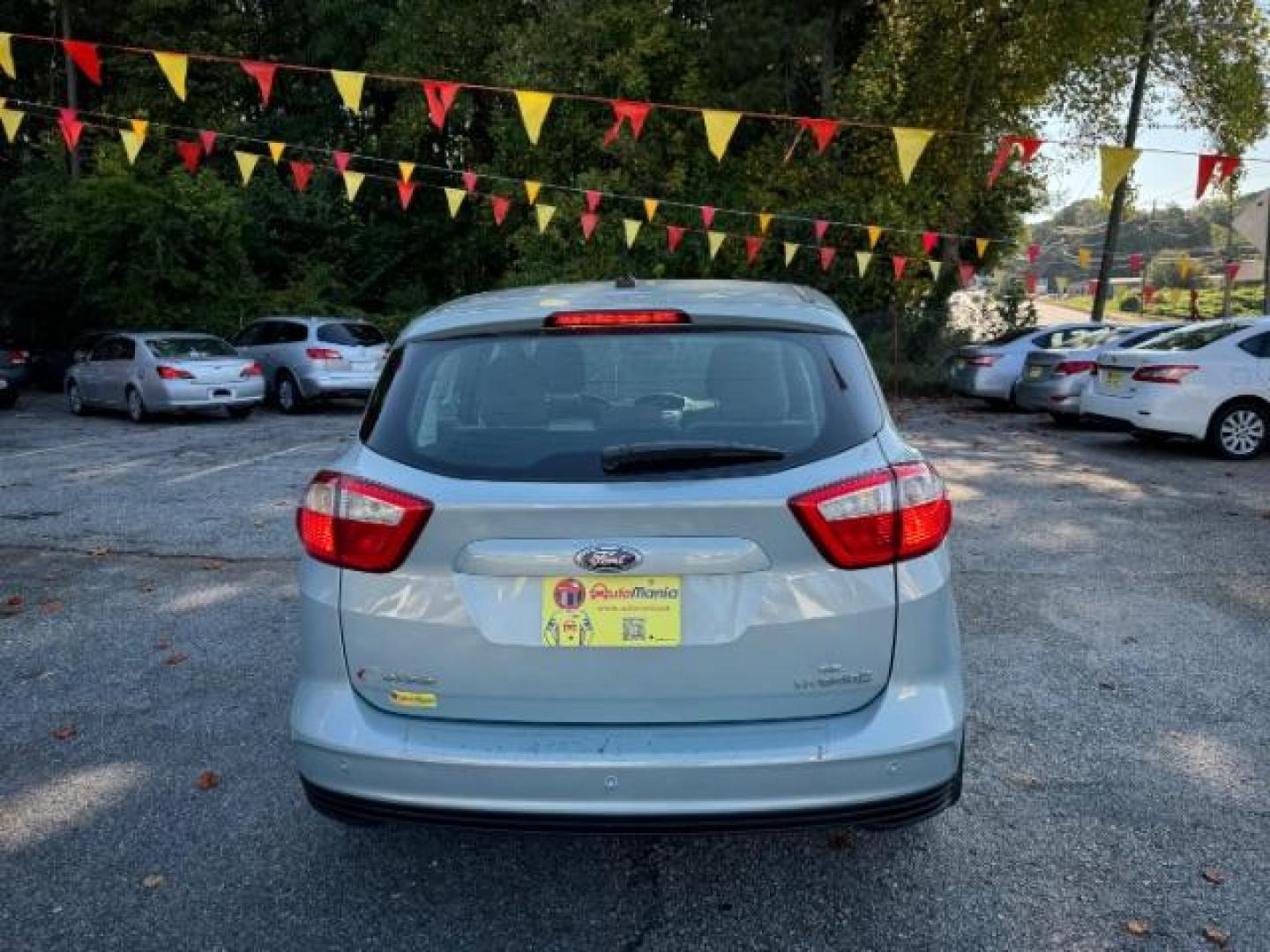 2013 Blue Ford C-Max Hybrid SE (1FADP5AU2DL) with an 2.0L L4 DOHC 16V HYBRID engine, Continuously Variable Transmission transmission, located at 1806 Veterans Memorial Hwy SW, Austell, GA, 30168, (770) 944-9558, 33.817959, -84.606987 - Photo#4