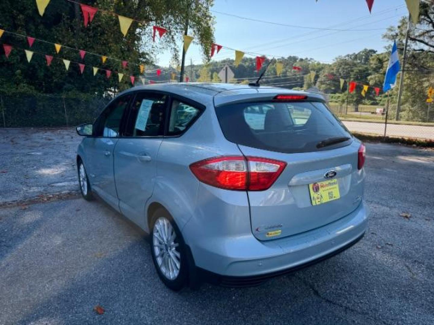 2013 Blue Ford C-Max Hybrid SE (1FADP5AU2DL) with an 2.0L L4 DOHC 16V HYBRID engine, Continuously Variable Transmission transmission, located at 1806 Veterans Memorial Hwy SW, Austell, GA, 30168, (770) 944-9558, 33.817959, -84.606987 - Photo#5