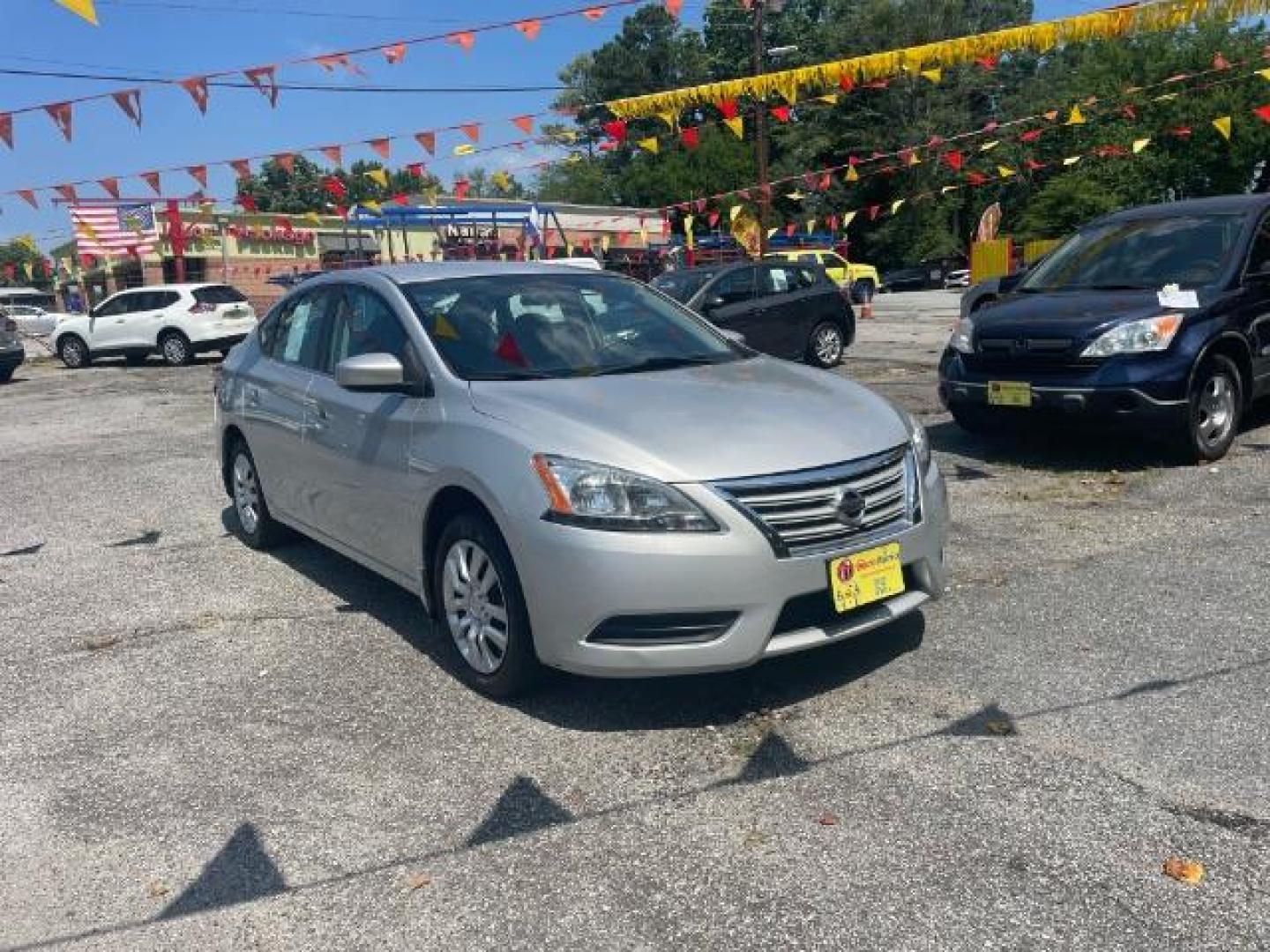 2013 Silver Nissan Sentra SV (1N4AB7AP2DN) with an 1.8L L4 SFI DOHC 16V engine, Continuously Variable Transmission transmission, located at 1806 Veterans Memorial Hwy SW, Austell, GA, 30168, (770) 944-9558, 33.817959, -84.606987 - Photo#2