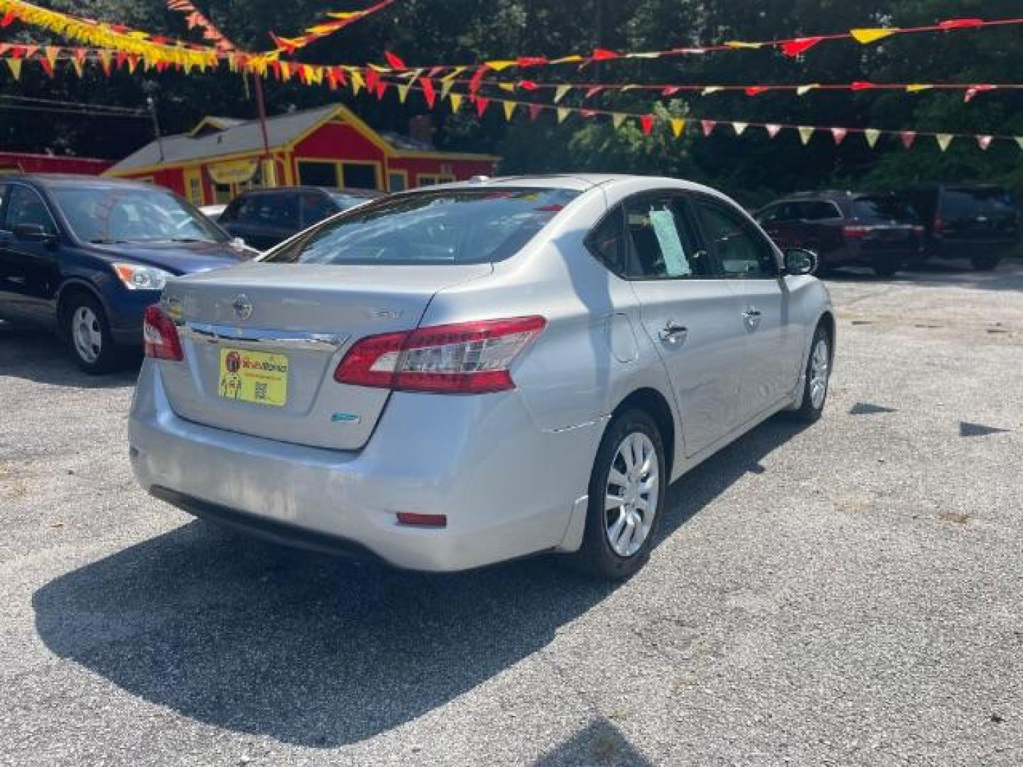 2013 Silver Nissan Sentra SV (1N4AB7AP2DN) with an 1.8L L4 SFI DOHC 16V engine, Continuously Variable Transmission transmission, located at 1806 Veterans Memorial Hwy SW, Austell, GA, 30168, (770) 944-9558, 33.817959, -84.606987 - Photo#3