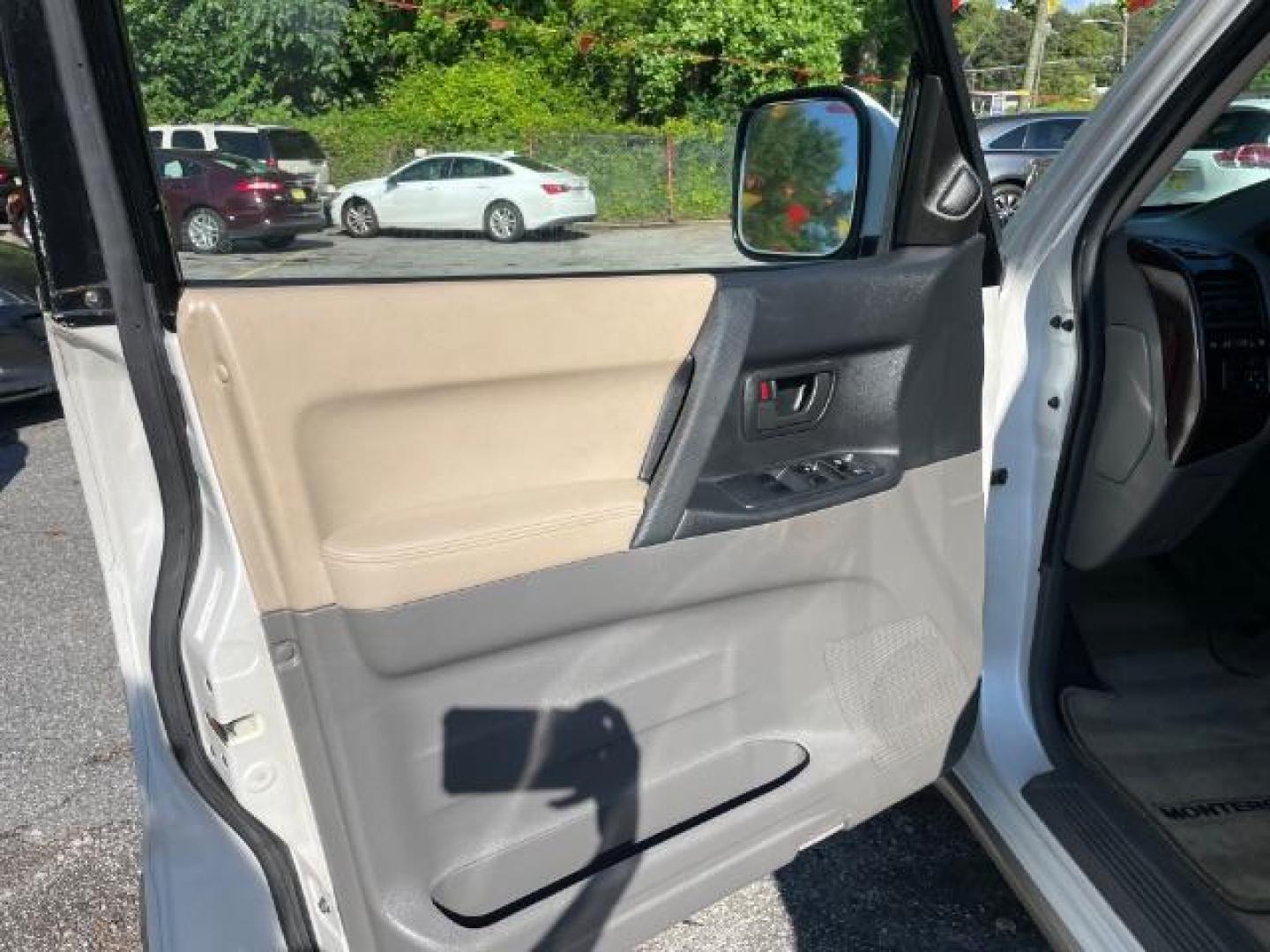 2002 White Mitsubishi Montero SPORT UTILITY 4-DR (JA4MW51R42J) with an 3.5L V6 SOHC 24V engine, 5-Speed Automatic transmission, located at 1806 Veterans Memorial Hwy SW, Austell, GA, 30168, (770) 944-9558, 33.817959, -84.606987 - Photo#10