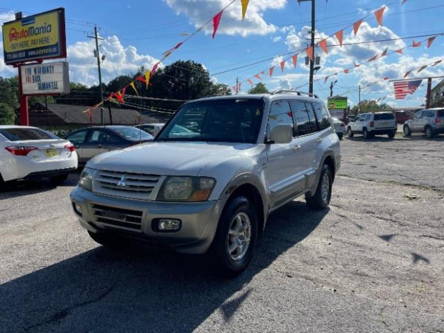 2002 White Mitsubishi Montero SPORT UTILITY 4-DR (JA4MW51R42J) with an 3.5L V6 SOHC 24V engine, 5-Speed Automatic transmission, located at 1806 Veterans Memorial Hwy SW, Austell, GA, 30168, (770) 944-9558, 33.817959, -84.606987 - Photo#14