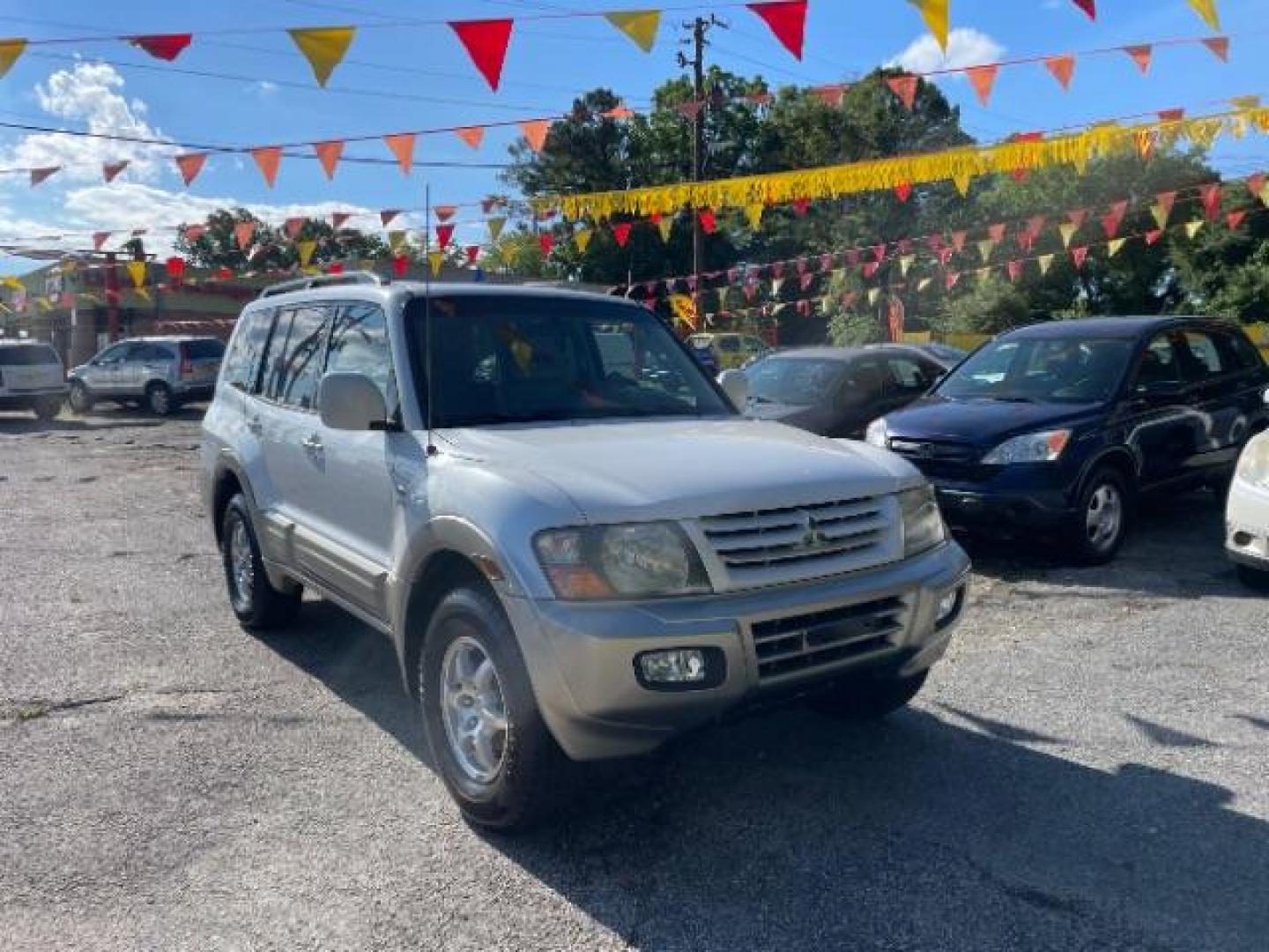 2002 White Mitsubishi Montero SPORT UTILITY 4-DR (JA4MW51R42J) with an 3.5L V6 SOHC 24V engine, 5-Speed Automatic transmission, located at 1806 Veterans Memorial Hwy SW, Austell, GA, 30168, (770) 944-9558, 33.817959, -84.606987 - Photo#17