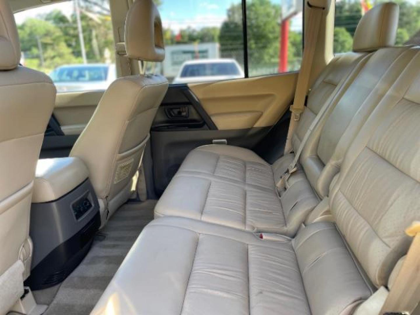 2002 White Mitsubishi Montero SPORT UTILITY 4-DR (JA4MW51R42J) with an 3.5L V6 SOHC 24V engine, 5-Speed Automatic transmission, located at 1806 Veterans Memorial Hwy SW, Austell, GA, 30168, (770) 944-9558, 33.817959, -84.606987 - Photo#29