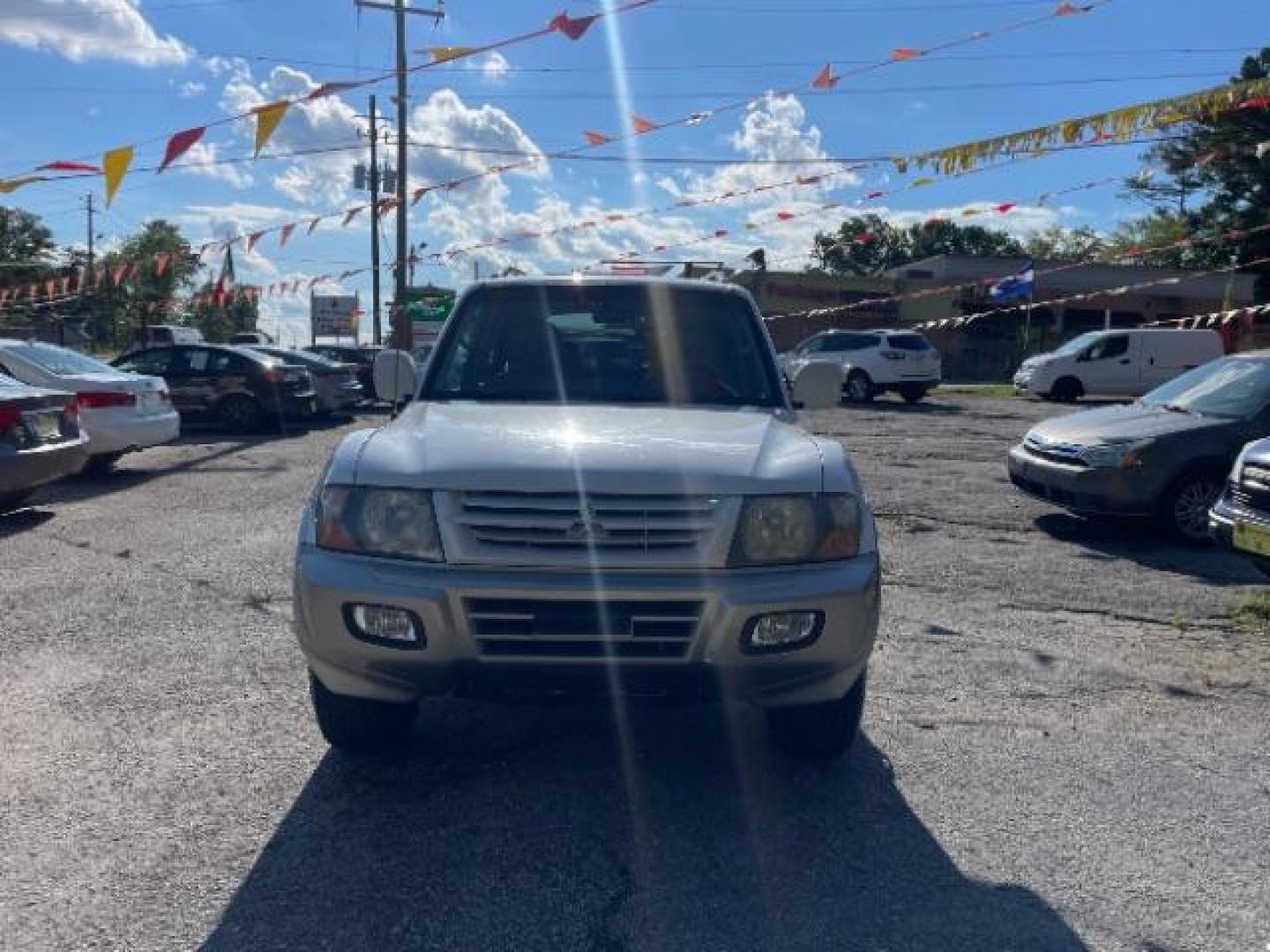 2002 White Mitsubishi Montero SPORT UTILITY 4-DR (JA4MW51R42J) with an 3.5L V6 SOHC 24V engine, 5-Speed Automatic transmission, located at 1806 Veterans Memorial Hwy SW, Austell, GA, 30168, (770) 944-9558, 33.817959, -84.606987 - Photo#16