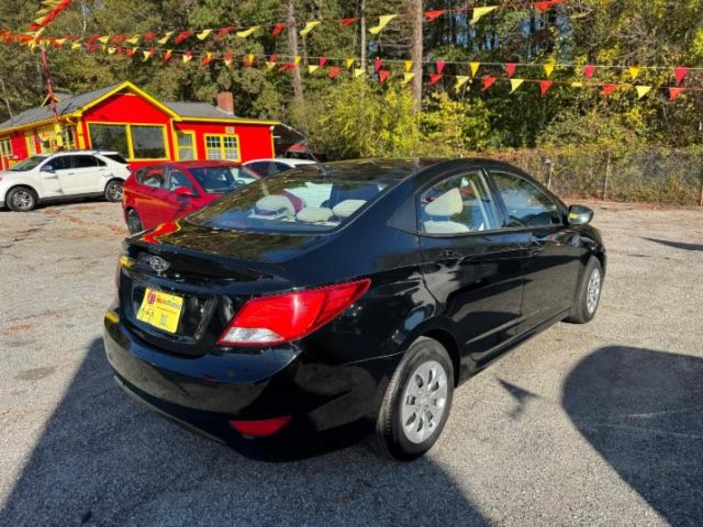 2017 Black Hyundai Accent SE 4-Door 6A (KMHCT4AE7HU) with an 1.6L L4 DOHC 16V engine, 6-Speed Automatic transmission, located at 1806 Veterans Memorial Hwy SW, Austell, GA, 30168, (770) 944-9558, 33.817959, -84.606987 - Photo#1