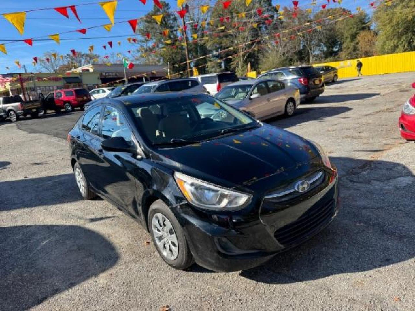 2017 Black Hyundai Accent SE 4-Door 6A (KMHCT4AE7HU) with an 1.6L L4 DOHC 16V engine, 6-Speed Automatic transmission, located at 1806 Veterans Memorial Hwy SW, Austell, GA, 30168, (770) 944-9558, 33.817959, -84.606987 - Photo#3