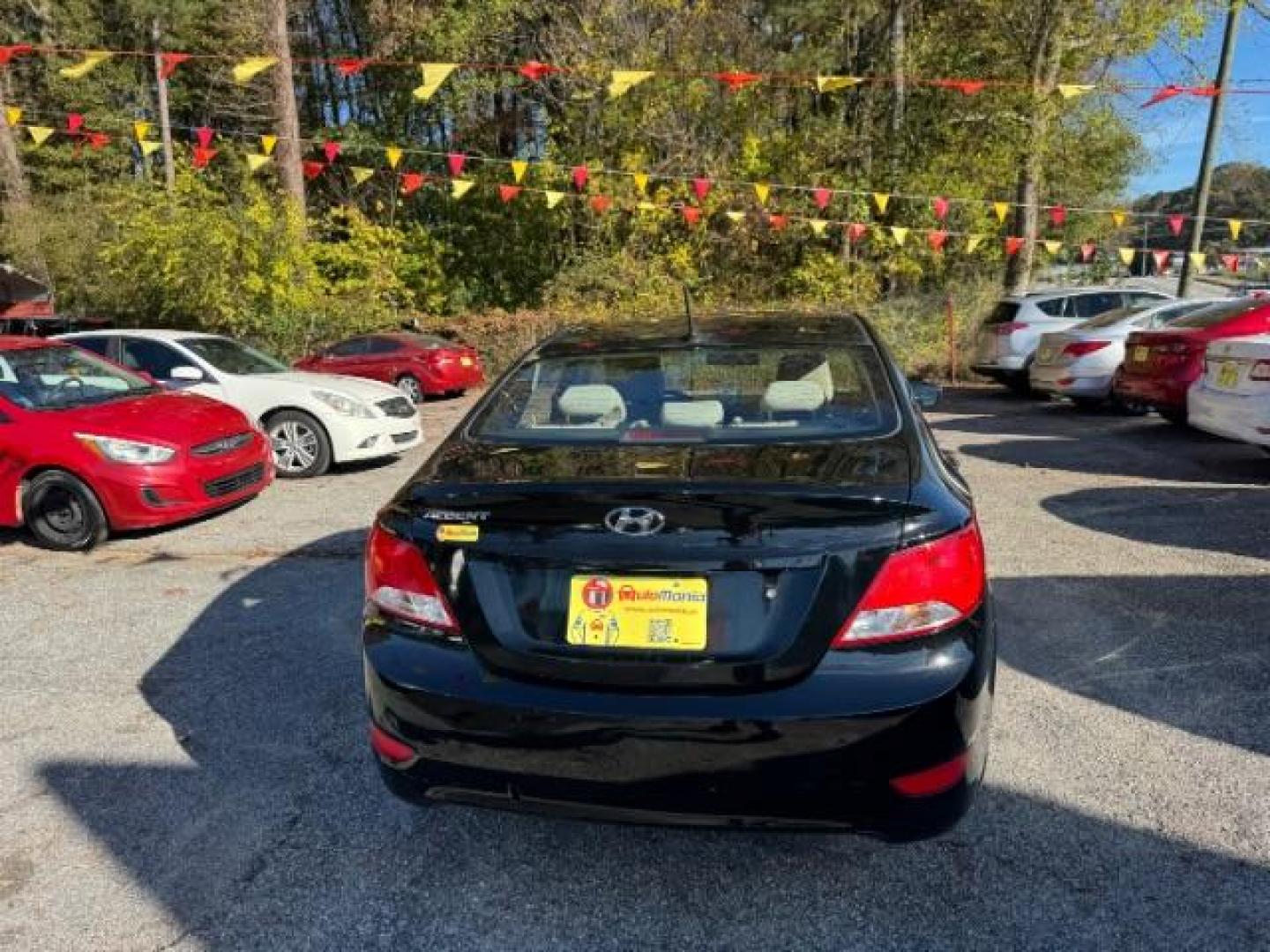 2017 Black Hyundai Accent SE 4-Door 6A (KMHCT4AE7HU) with an 1.6L L4 DOHC 16V engine, 6-Speed Automatic transmission, located at 1806 Veterans Memorial Hwy SW, Austell, GA, 30168, (770) 944-9558, 33.817959, -84.606987 - Photo#6