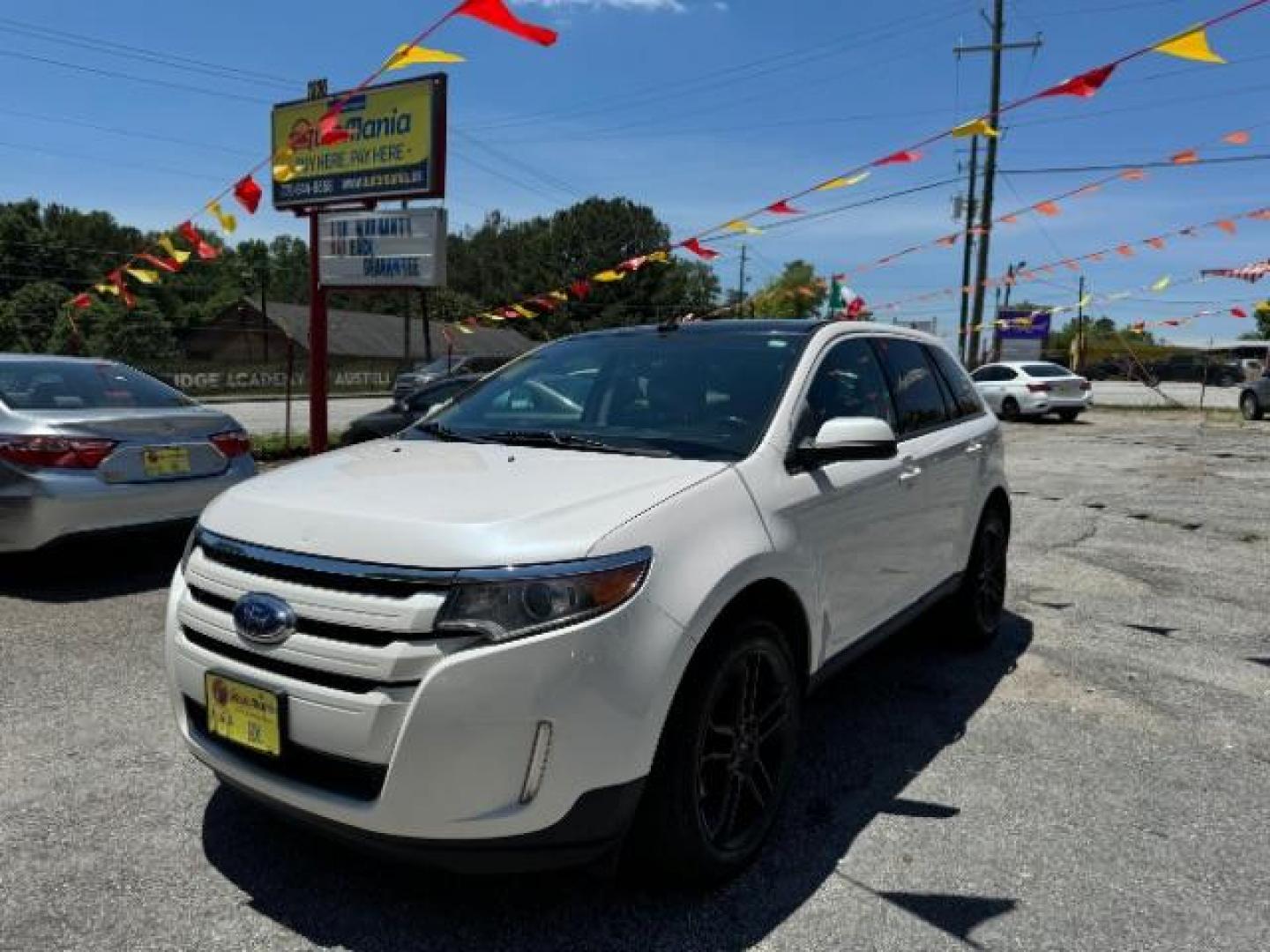 2013 White Ford Edge SEL FWD (2FMDK3JC7DB) with an 3.5L V6 DOHC 24V engine, 6-Speed Automatic transmission, located at 1806 Veterans Memorial Hwy SW, Austell, GA, 30168, (770) 944-9558, 33.817959, -84.606987 - Photo#0