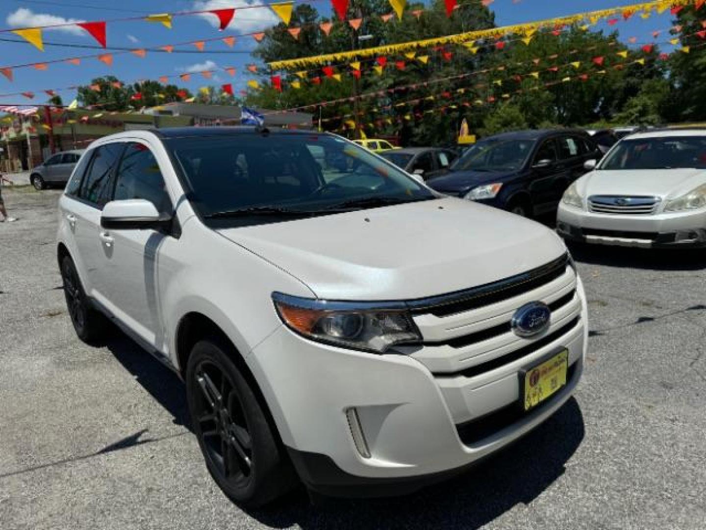 2013 White Ford Edge SEL FWD (2FMDK3JC7DB) with an 3.5L V6 DOHC 24V engine, 6-Speed Automatic transmission, located at 1806 Veterans Memorial Hwy SW, Austell, GA, 30168, (770) 944-9558, 33.817959, -84.606987 - Photo#2