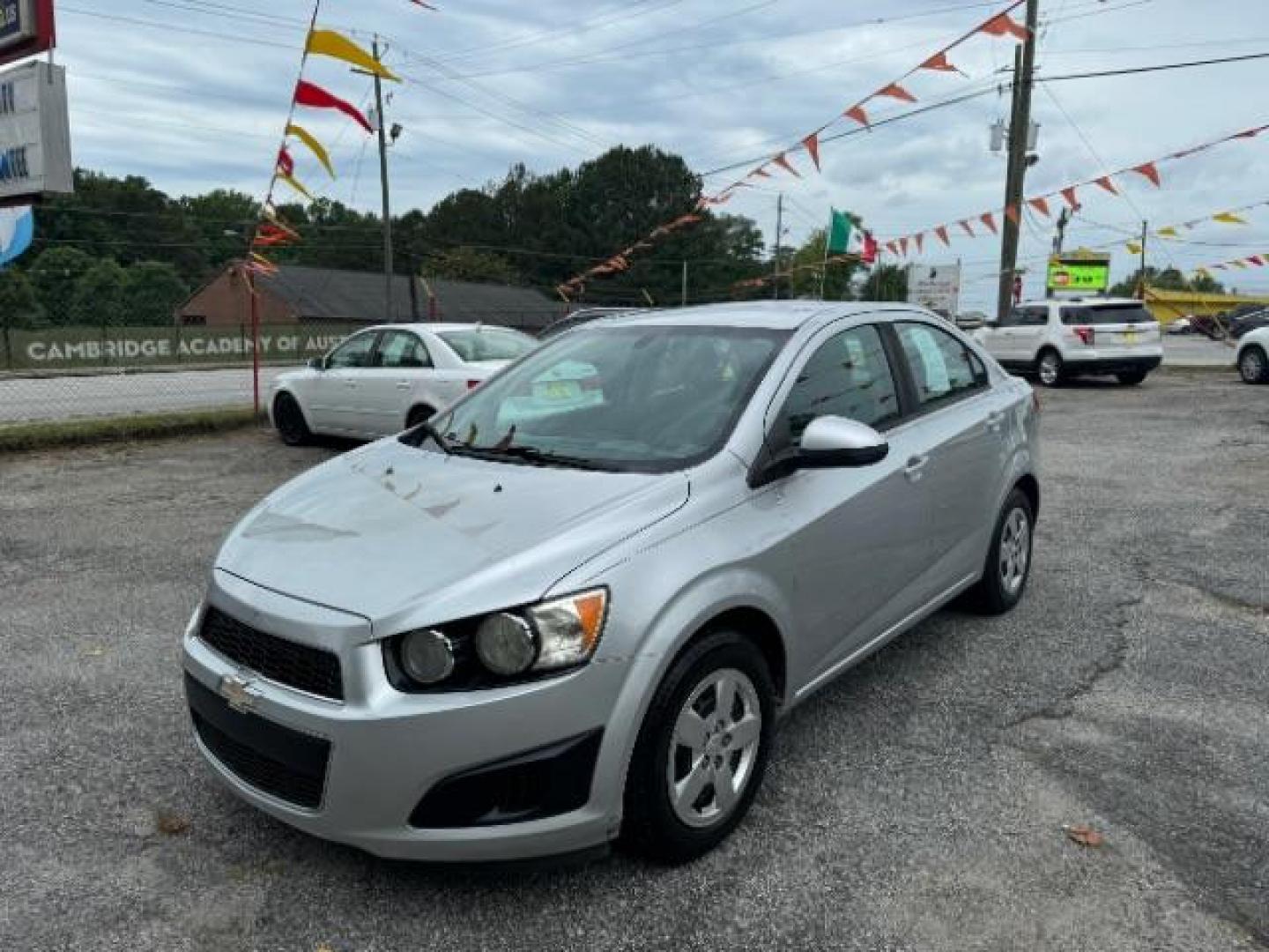 2015 Silver Chevrolet Sonic LS Auto Sedan (1G1JA5SH0F4) with an 1.8L L4 DOHC 24V engine, 6-Speed Automatic transmission, located at 1806 Veterans Memorial Hwy SW, Austell, GA, 30168, (770) 944-9558, 33.817959, -84.606987 - Photo#0