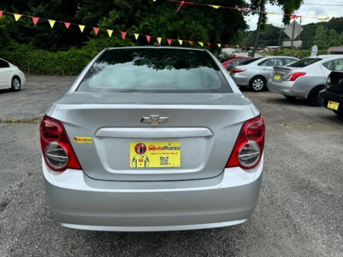 2015 Silver Chevrolet Sonic LS Auto Sedan (1G1JA5SH0F4) with an 1.8L L4 DOHC 24V engine, 6-Speed Automatic transmission, located at 1806 Veterans Memorial Hwy SW, Austell, GA, 30168, (770) 944-9558, 33.817959, -84.606987 - Photo#4