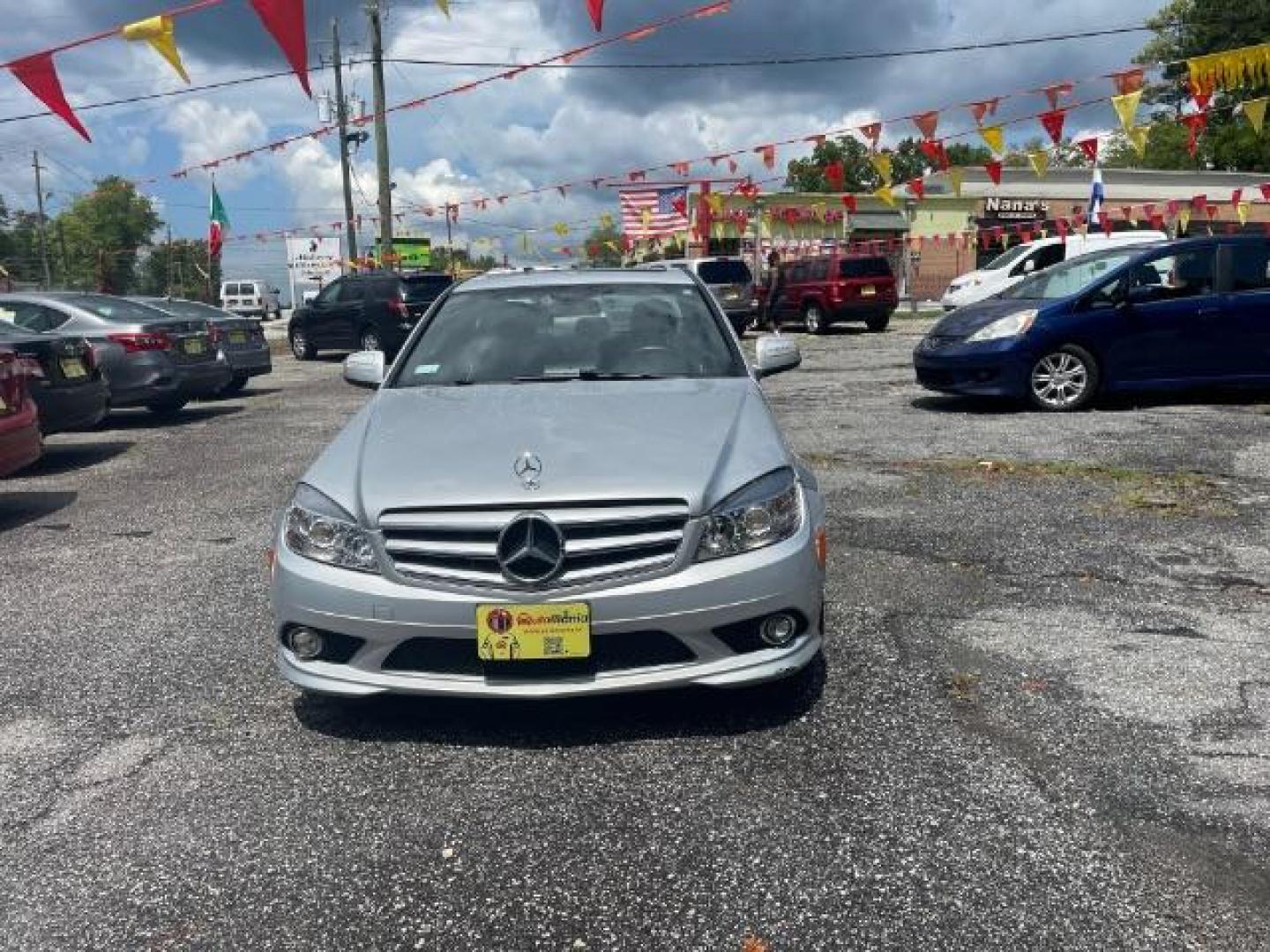 2009 Silver Mercedes-Benz C-Class C300 4MATIC Sport Sedan (WDDGF81X49R) with an 3.0L V6 DOHC 24V engine, 7-Speed Automatic transmission, located at 1806 Veterans Memorial Hwy SW, Austell, GA, 30168, (770) 944-9558, 33.817959, -84.606987 - Photo#1