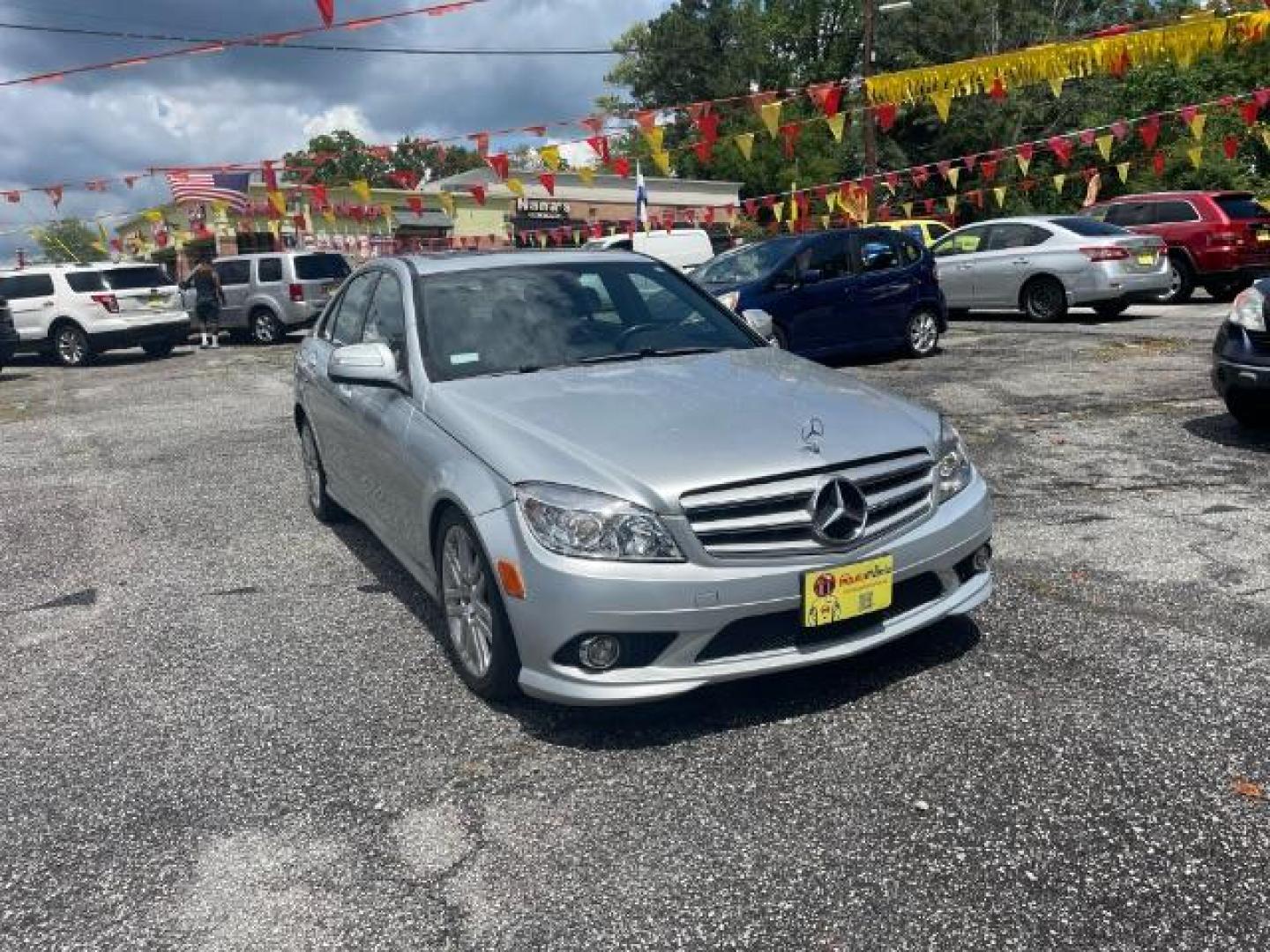 2009 Silver Mercedes-Benz C-Class C300 4MATIC Sport Sedan (WDDGF81X49R) with an 3.0L V6 DOHC 24V engine, 7-Speed Automatic transmission, located at 1806 Veterans Memorial Hwy SW, Austell, GA, 30168, (770) 944-9558, 33.817959, -84.606987 - Photo#2