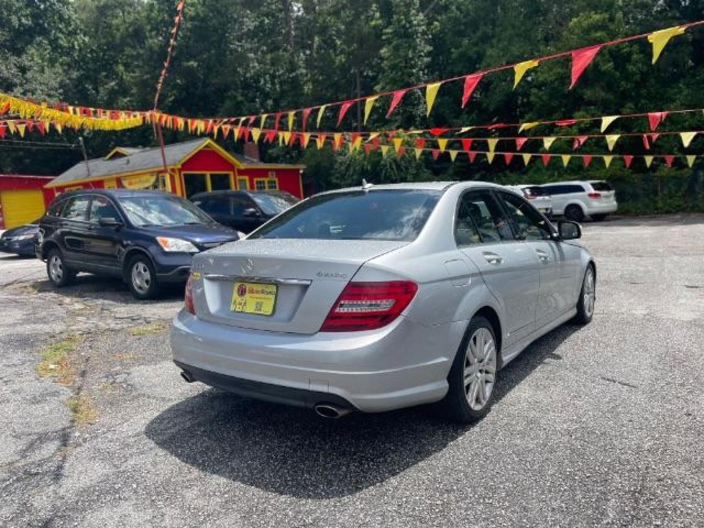 2009 Silver Mercedes-Benz C-Class C300 4MATIC Sport Sedan (WDDGF81X49R) with an 3.0L V6 DOHC 24V engine, 7-Speed Automatic transmission, located at 1806 Veterans Memorial Hwy SW, Austell, GA, 30168, (770) 944-9558, 33.817959, -84.606987 - Photo#5