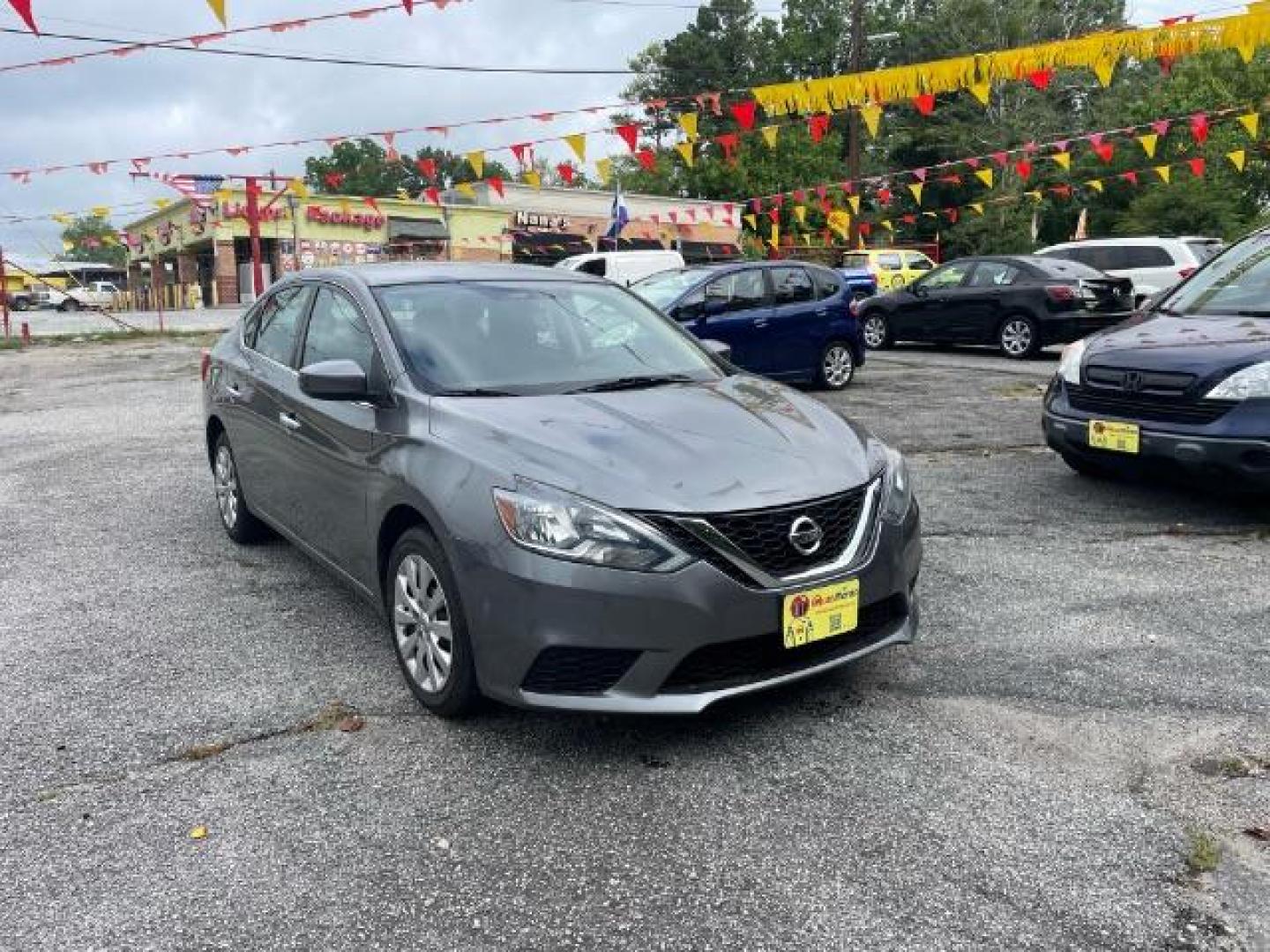 2017 Gray Nissan Sentra SV (3N1AB7AP4HY) with an 1.8L L4 SFI DOHC 16V engine, Continuously Variable Transmission transmission, located at 1806 Veterans Memorial Hwy SW, Austell, GA, 30168, (770) 944-9558, 33.817959, -84.606987 - Photo#2