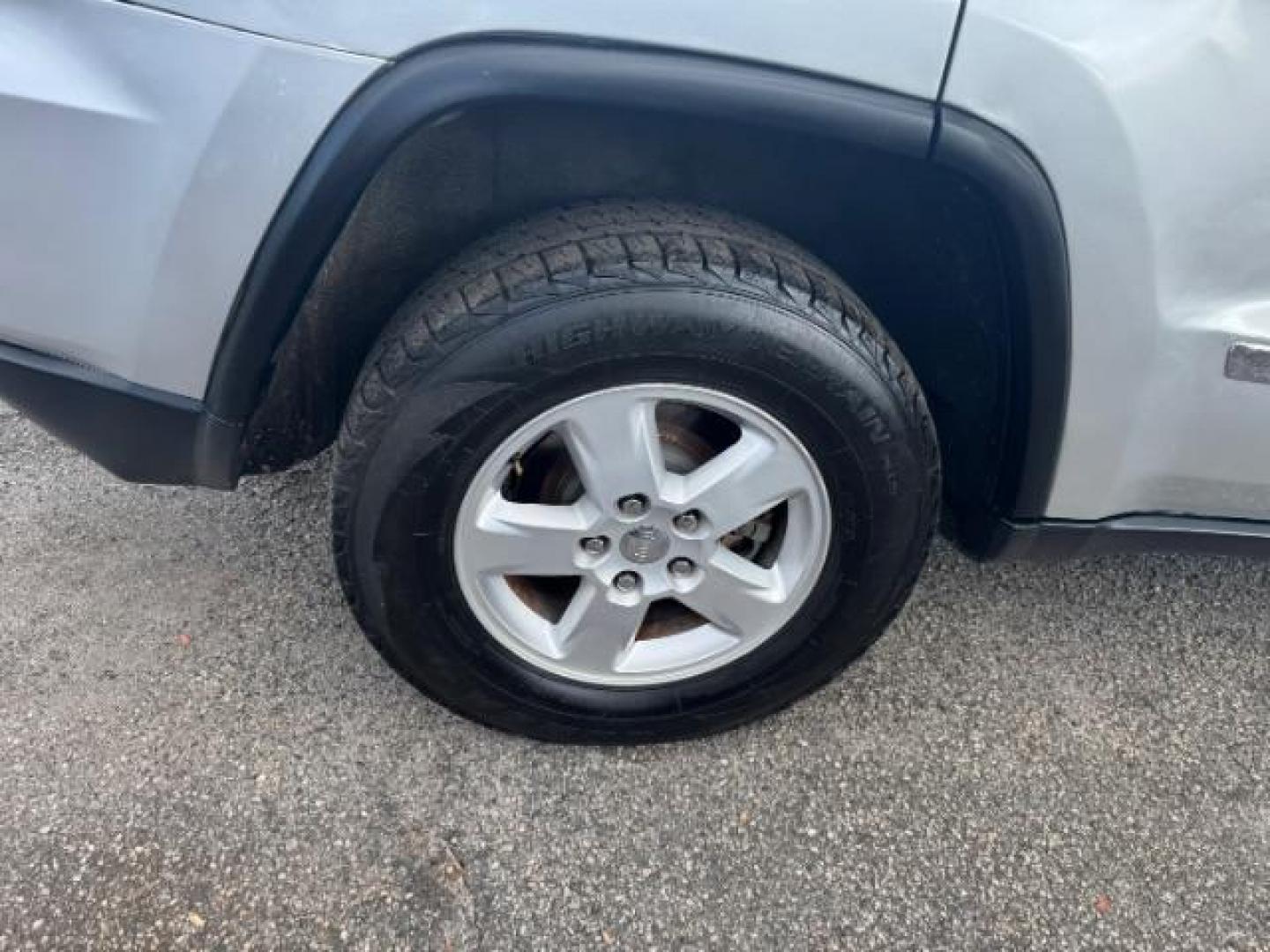 2012 Silver Jeep Grand Cherokee Laredo 2WD (1C4RJEAG6CC) with an 3.6L V6 DOHC 24V engine, 5-Speed Automatic transmission, located at 1806 Veterans Memorial Hwy SW, Austell, GA, 30168, (770) 944-9558, 33.817959, -84.606987 - Photo#21