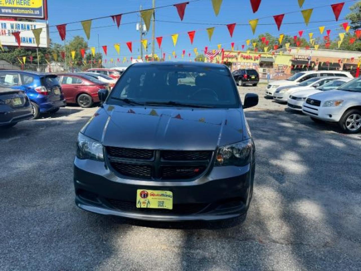 2016 Gray Dodge Grand Caravan SE Plus (2C4RDGBG6GR) with an 3.6L V6 DOHC 24V engine, 6-Speed Automatic transmission, located at 1806 Veterans Memorial Hwy SW, Austell, GA, 30168, (770) 944-9558, 33.817959, -84.606987 - Photo#1