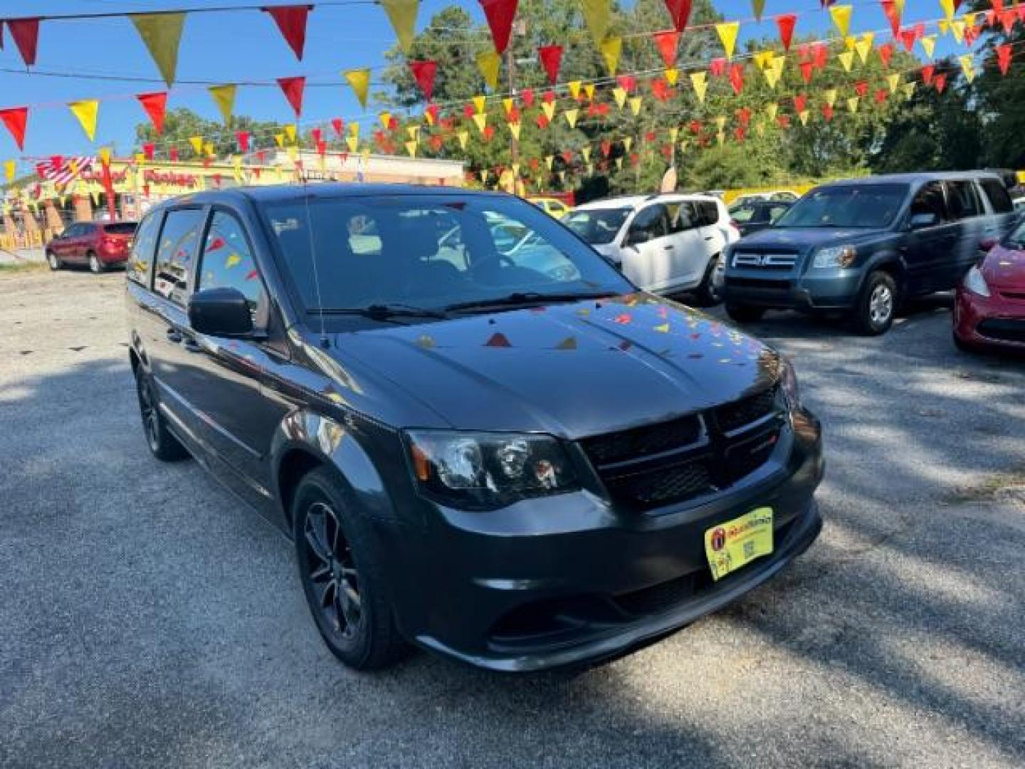 2016 Gray Dodge Grand Caravan SE Plus (2C4RDGBG6GR) with an 3.6L V6 DOHC 24V engine, 6-Speed Automatic transmission, located at 1806 Veterans Memorial Hwy SW, Austell, GA, 30168, (770) 944-9558, 33.817959, -84.606987 - Photo#2