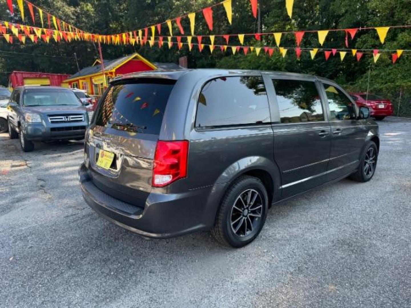 2016 Gray Dodge Grand Caravan SE Plus (2C4RDGBG6GR) with an 3.6L V6 DOHC 24V engine, 6-Speed Automatic transmission, located at 1806 Veterans Memorial Hwy SW, Austell, GA, 30168, (770) 944-9558, 33.817959, -84.606987 - Photo#3