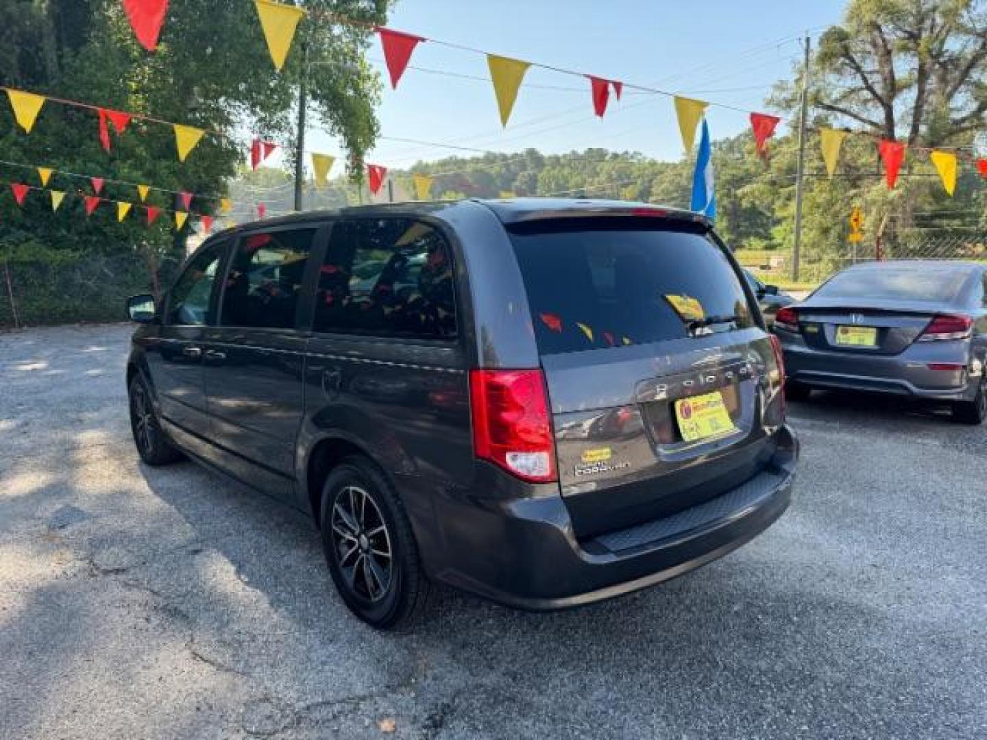 2016 Gray Dodge Grand Caravan SE Plus (2C4RDGBG6GR) with an 3.6L V6 DOHC 24V engine, 6-Speed Automatic transmission, located at 1806 Veterans Memorial Hwy SW, Austell, GA, 30168, (770) 944-9558, 33.817959, -84.606987 - Photo#5